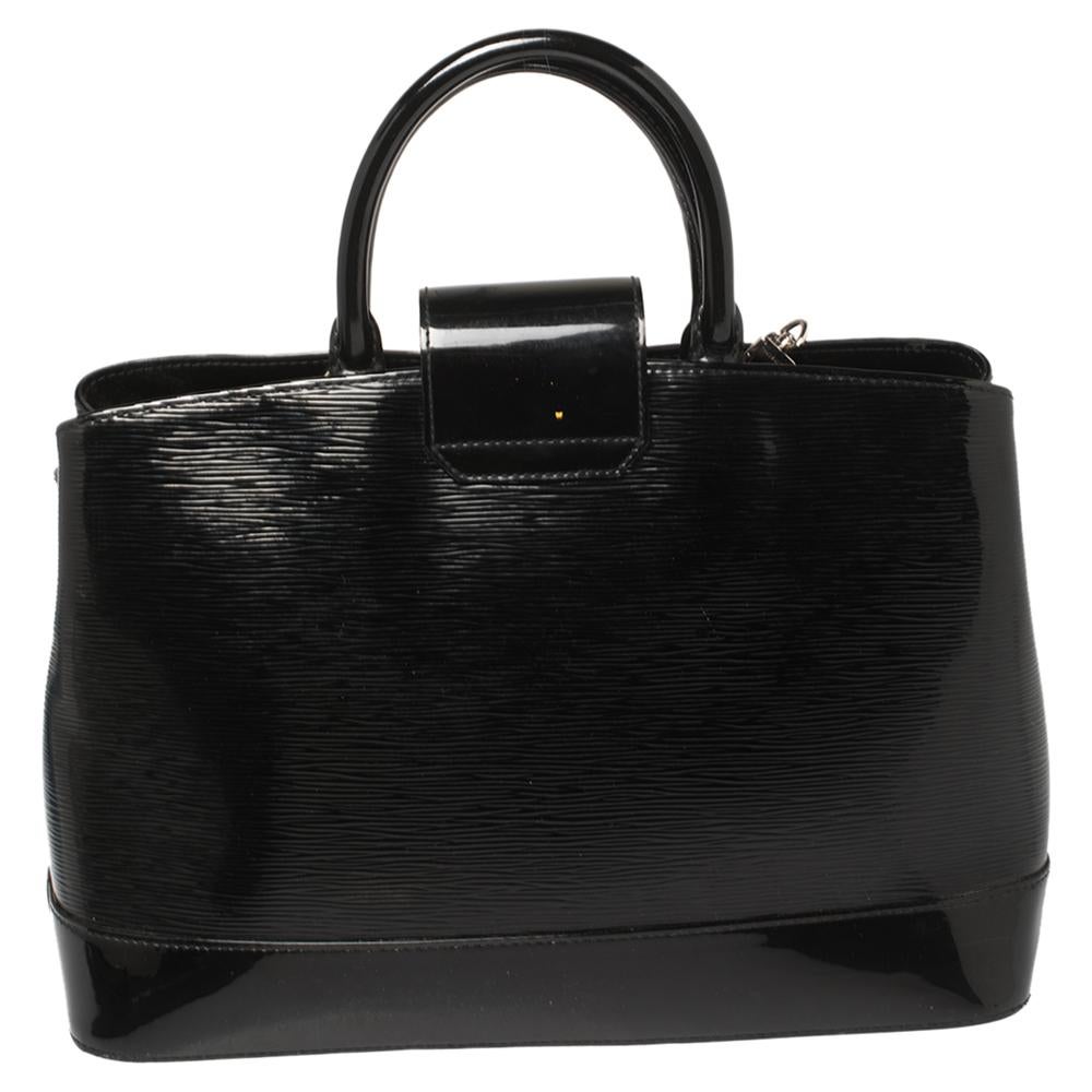 Everybody wants a bag as fabulous as this one from Louis Vuitton. It is made from high-quality Electric Epi leather and designed to assist you every day. The bag carries a black hue and a turn-lock that leads to an Alcantara-lined interior that will