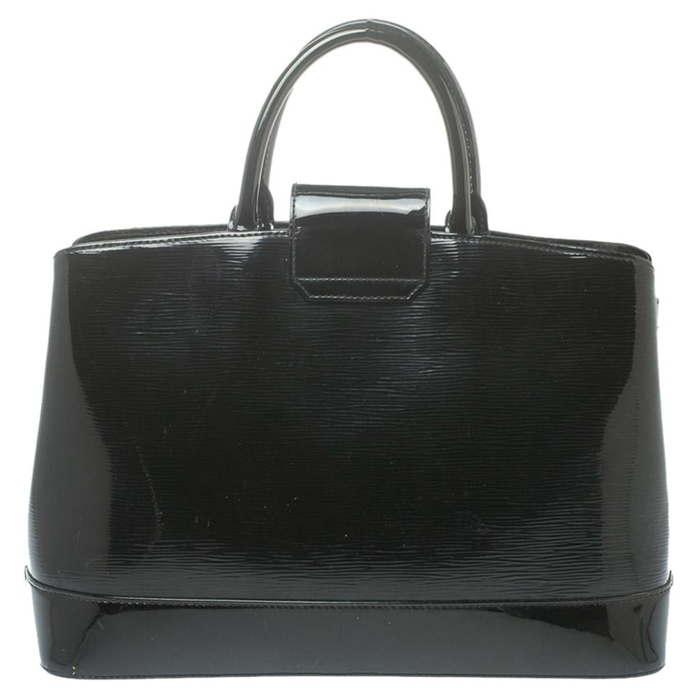 Everybody wants a bag as fabulous as this one from Louis Vuitton. It is made from high-quality patent epi leather and designed to assist you every day. The bag carries a black hue and a turn-lock that leads to an Alcantara-lined interior that will