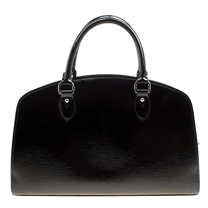 Louis Vuitton's handbags are popular owing to their high style and functionality. This Pont Neuf bag, like all the other handbags, is durable and stylish. Crafted from Epi leather, the bag comes with two top handles, a top zip closure and a padlock.