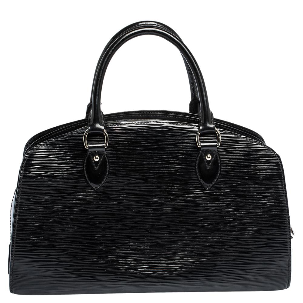 Louis Vuitton's handbags are popular owing to their high style and functionality. This Pont Neuf bag, like all the other handbags, is durable and stylish. Crafted from Electric Epi leather into a structured silhouette, the bag comes with two top