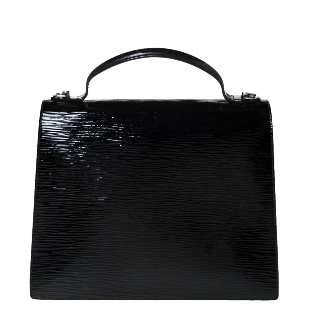 This beautifully structured Louis Vuitton Electric Epi leather bag will definitely add the luxury touch to your outfit whether it's for work or a fancy evening out. It features a glossy textured exterior, a top handle and a detachable strap. It also