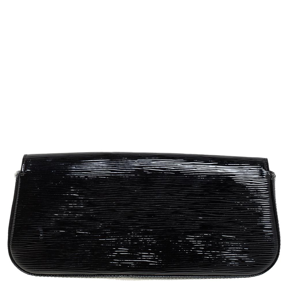 Well-crafted and overflowing with style this Sobe clutch is from Louis Vuitton. It has an epi patent leather exterior, a fabric interior, and a large LV adorned on the flap. This creation will lift all your gowns and elegant outfits.