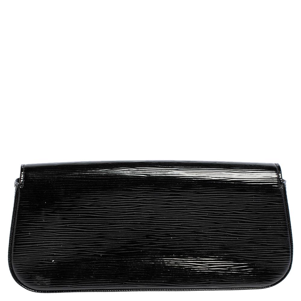 Well-crafted and overflowing with style this Sobe clutch is from Louis Vuitton. It has a Epi Leather exterior, a fabric interior and a large LV adorned on the flap. This creation will lift all your gowns and elegant outfits.

