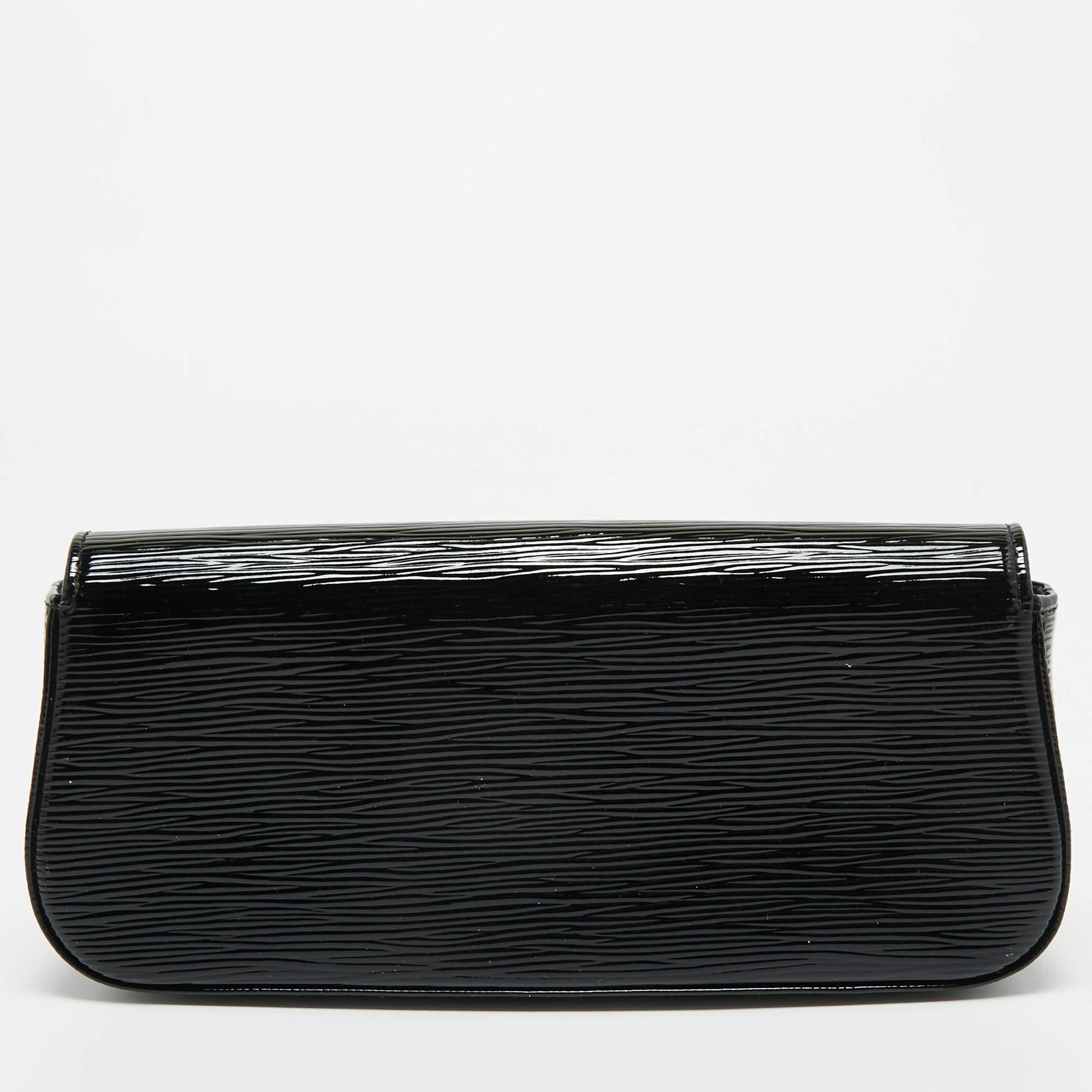 Well-crafted and overflowing with style, this Sobe clutch is from Louis Vuitton. It has a luxe exterior, a roomy interior, and a large LV adorned on the flap. This creation will complement all your dresses and elegant outfits.

Includes: Original