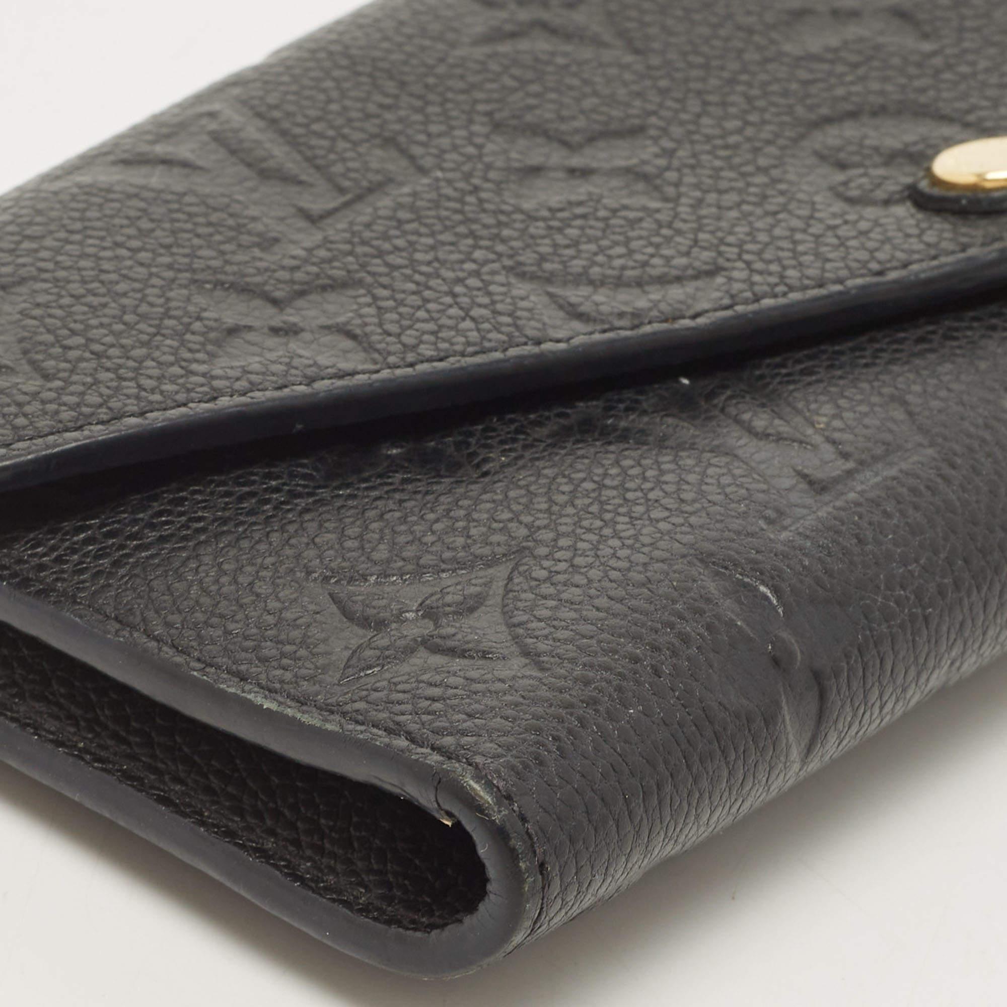 Created from Empreinte leather, the Josephine wallet by Louis Vuitton has a fine finish. The wallet features an envelope flap that opens to reveal multiple compartments within. This sophisticated piece will be a great addition to your daily style.

