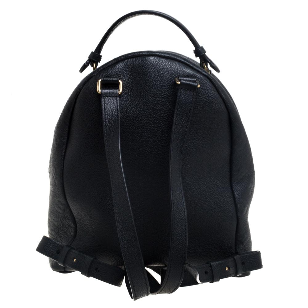 Louis Vuitton's Sorbonne backpack boasts of fabulous style and outstanding details. It flaunts an Empreinte leather exterior with a front zip pocket. The bag has a top handle, dual shoulder straps, and the fabric insides are also sized to carry your