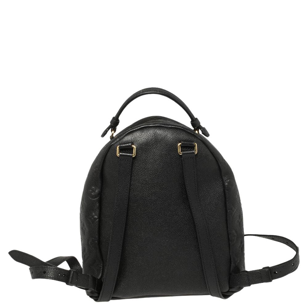 Louis Vuitton's Sorbonne backpack boasts of fabulous style and outstanding details. It flaunts an Empreinte leather exterior with a front zip pocket. The bag has a top handle, dual shoulder straps, and the fabric insides are also sized to carry your