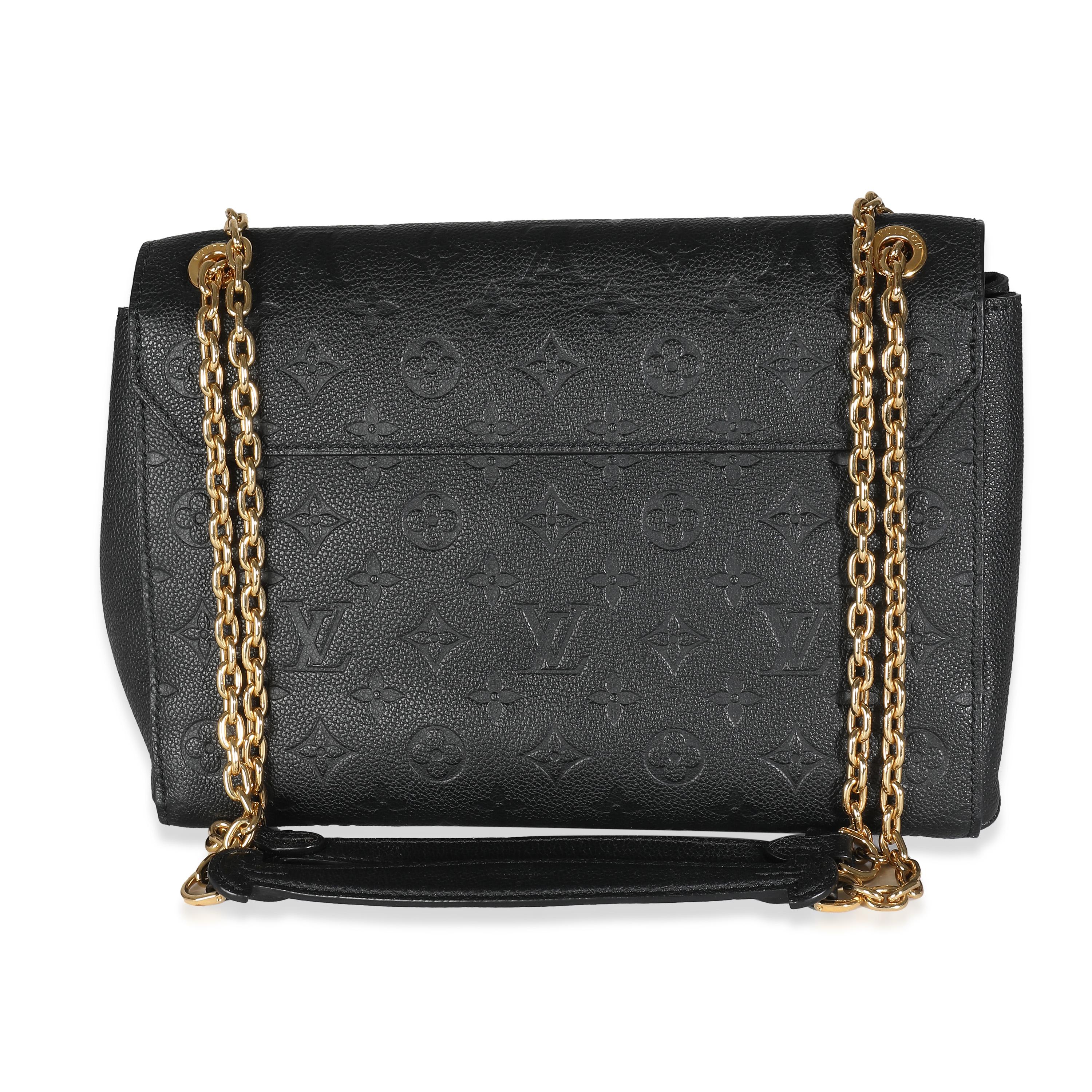 Listing Title: Louis Vuitton Black Empreinte Vavin MM
SKU: 139078
MSRP: 3100.00 USD
Condition: Pre-owned 
Handbag Condition: Very Good
Condition Comments: Item is in very good condition with minor signs of wear. Light scuffing along interior.