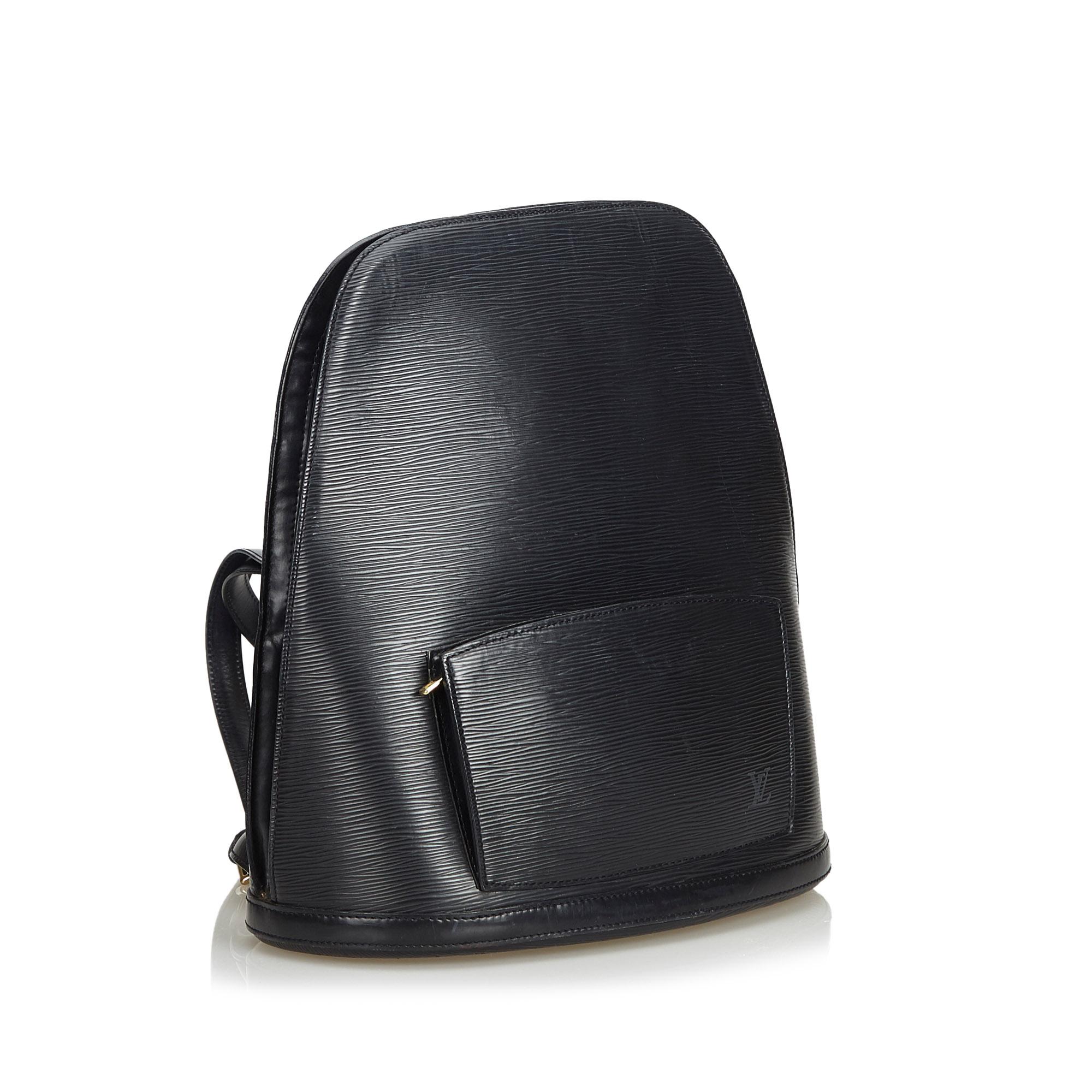 The Gobelins features Epi leather, flat back straps, an exterior zip pocket, a two-way zip around closure, alcantara lining, and an interior flat pocket. It carries as B+ condition rating.

Inclusions: 
This item does not come with