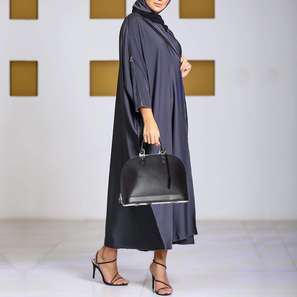Out of all the irresistible handbags from Louis Vuitton the Alma is the most structured one. First introduced in 1934 by Gaston Louis Vuitton the Alma is a classic that has received love from icons. This piece comes crafted from Epi leather