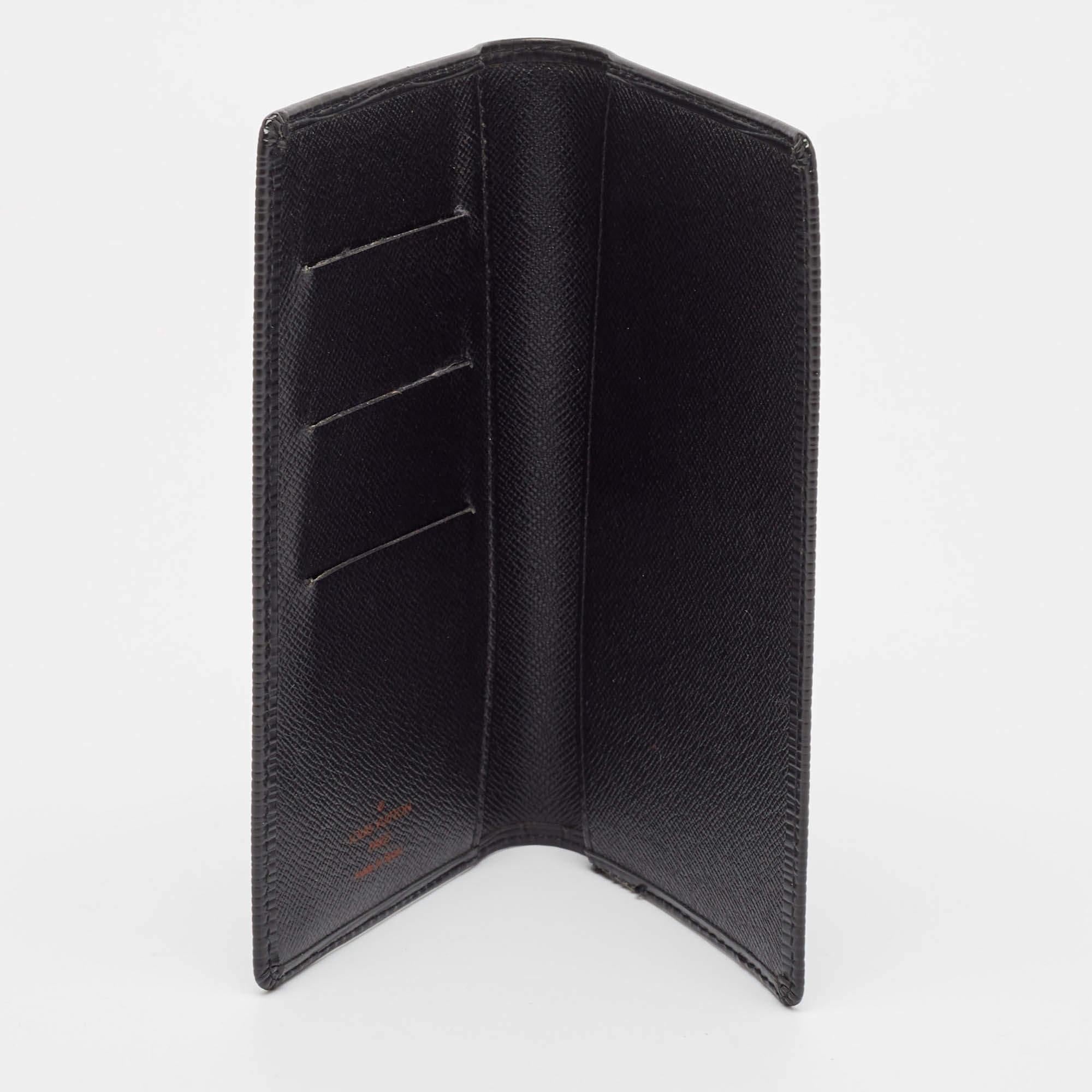 This LV black Epi wallet effortlessly combines meticulous construction with ageless style  making it a symbol of refined taste. Elevate your accessory collection with this designer piece.