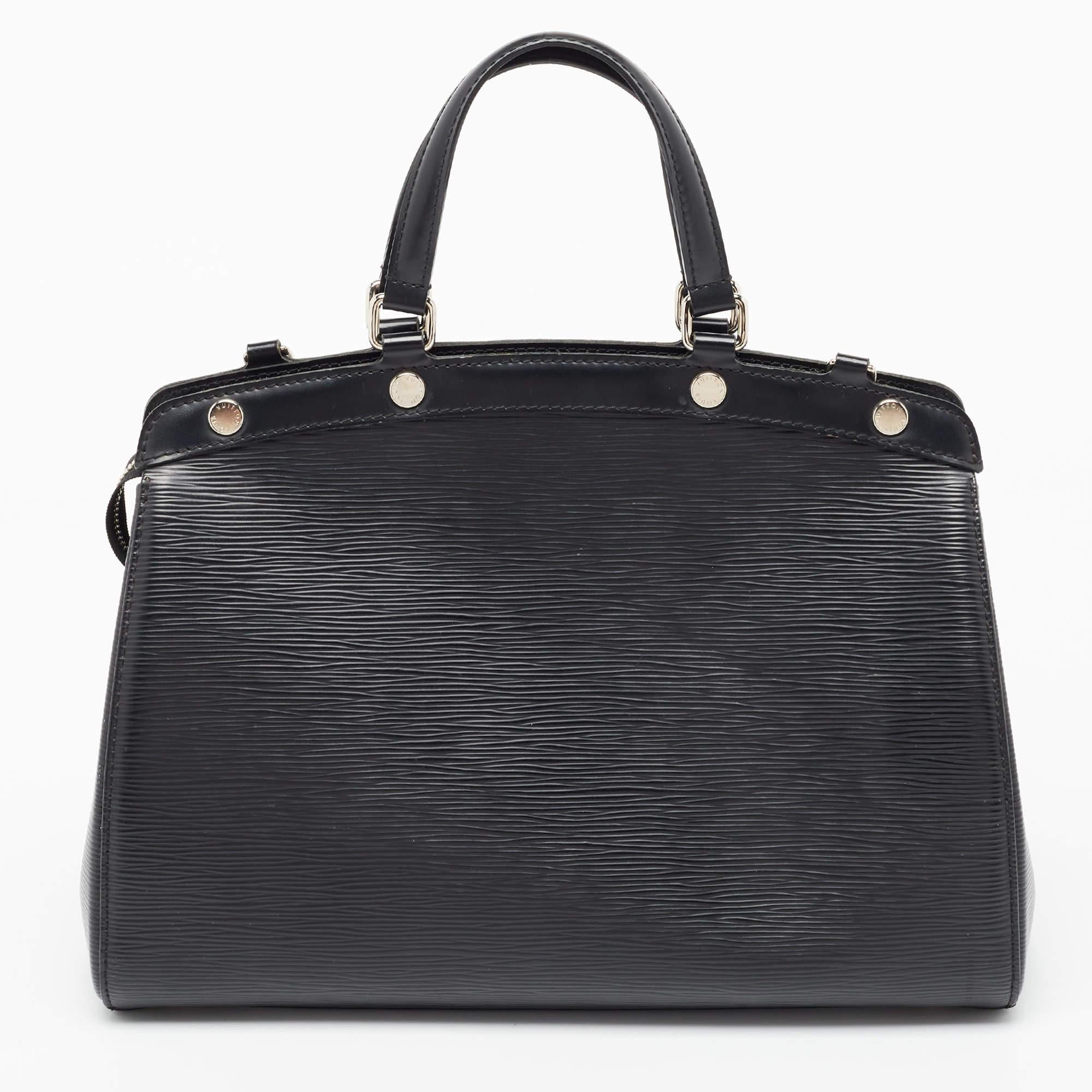 Designer bags are ideal companions for ample occasions! Here we have a fashion-meets-functionality piece crafted with precision. It has been equipped with a well-sized interior that can easily fit your essentials.

Includes: Original Dust Cloth,