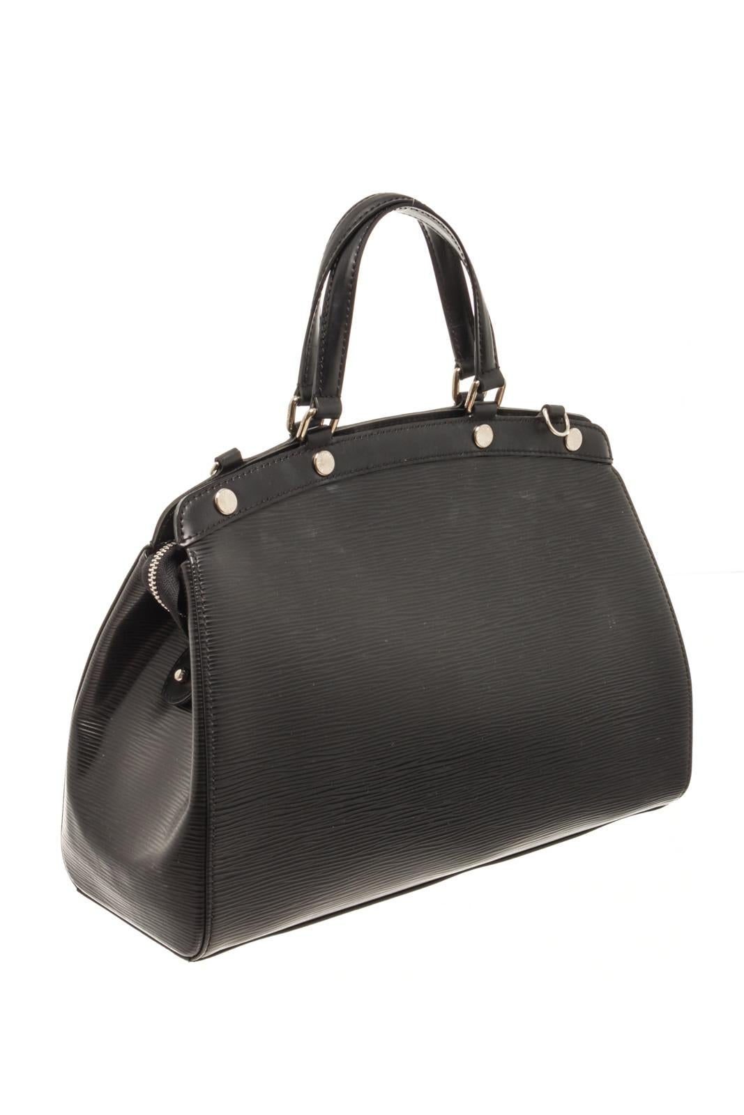 Louis Vuitton Black Epi Leather Brea MM Bag with the feminine shape of louis vuitton's brea is inspired by the doctor's bag. crafted from epi leather in black, the bag has a perfect finish. the fabric interior is spacious and it is secured by a