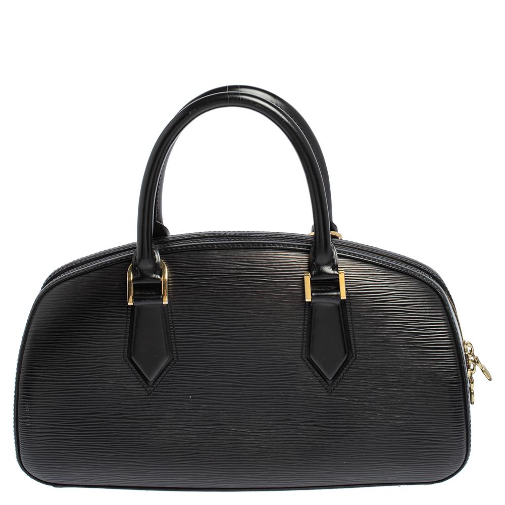 Add some magic to your everyday attire with this classy black Jasmin bag crafted from Epi leather and featuring an Alcantara interior, to give you durability along with supreme style. This Louis Vuitton piece is designed with two top handles and a