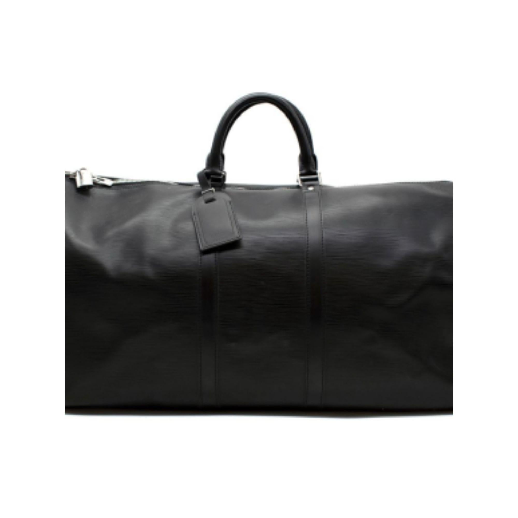 Louis Vuitton Black Epi Leather Keepall Bandoulière 55

-Silver tone hardware 
-Large capacity
-Cabin size
-Zip closure with padlock 
-Ultra-soft Taiga leather
-One main compartment 

Material: 

Leather 

Made in Italy 

9.5/10 excellent