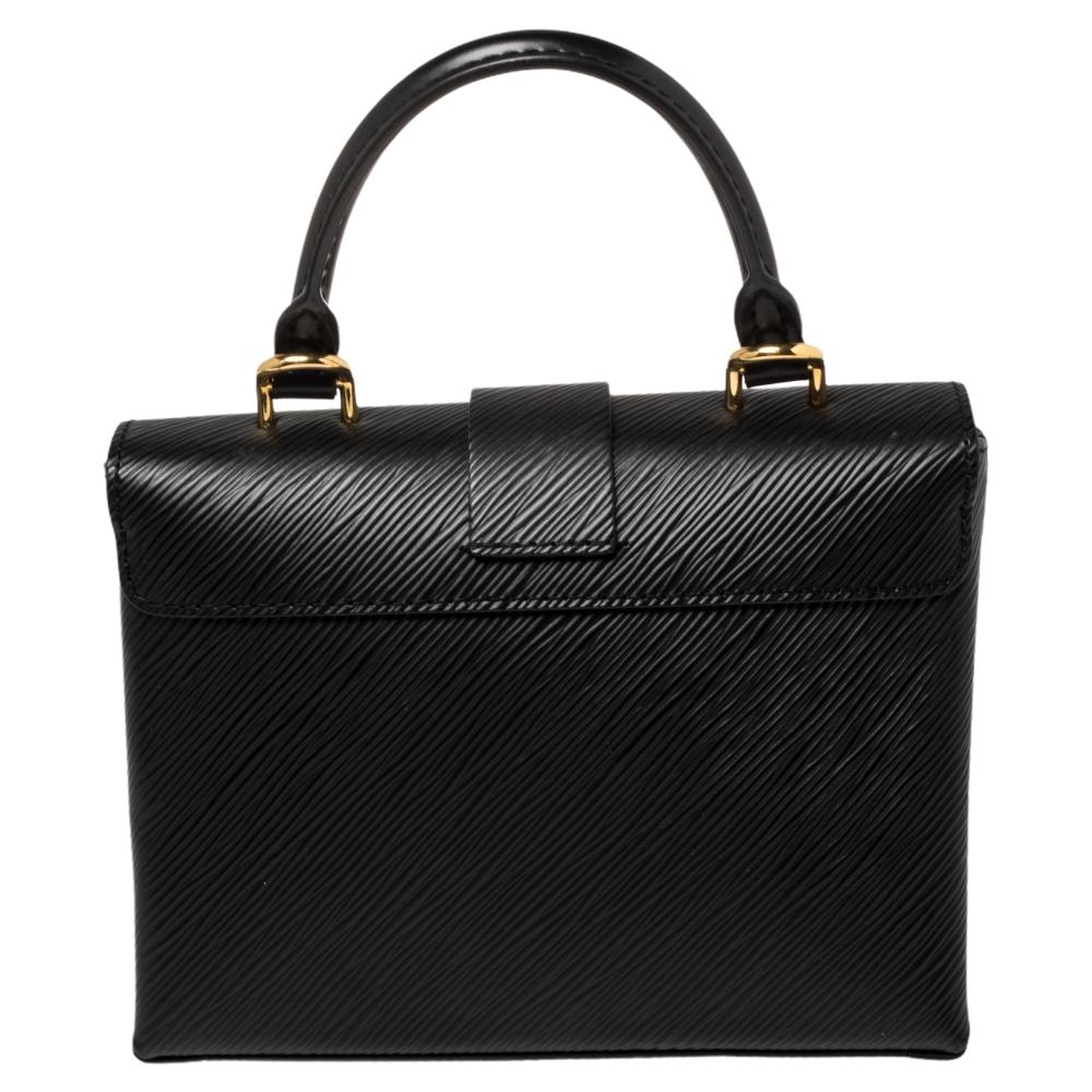 Small and structured, the Locky BB bag in Epi leather combines refinement with bold statement style, thanks to an oversized gold-metal LV padlock closure. A fashionable day-to-evening piece, it can be worn in any number of ways to suit the mood or