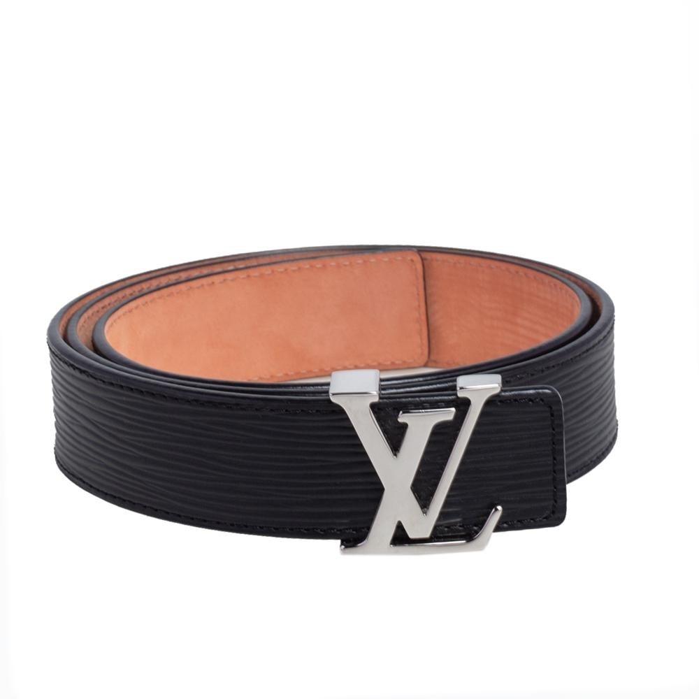 This Initiales belt from Louis Vuitton is simple in design but nevertheless quite appealing. The Epi leather belt has silver-tone hardware in the form of the enlarged iconic LV symbol and the brand name is also engraved on the backside.

Includes:
