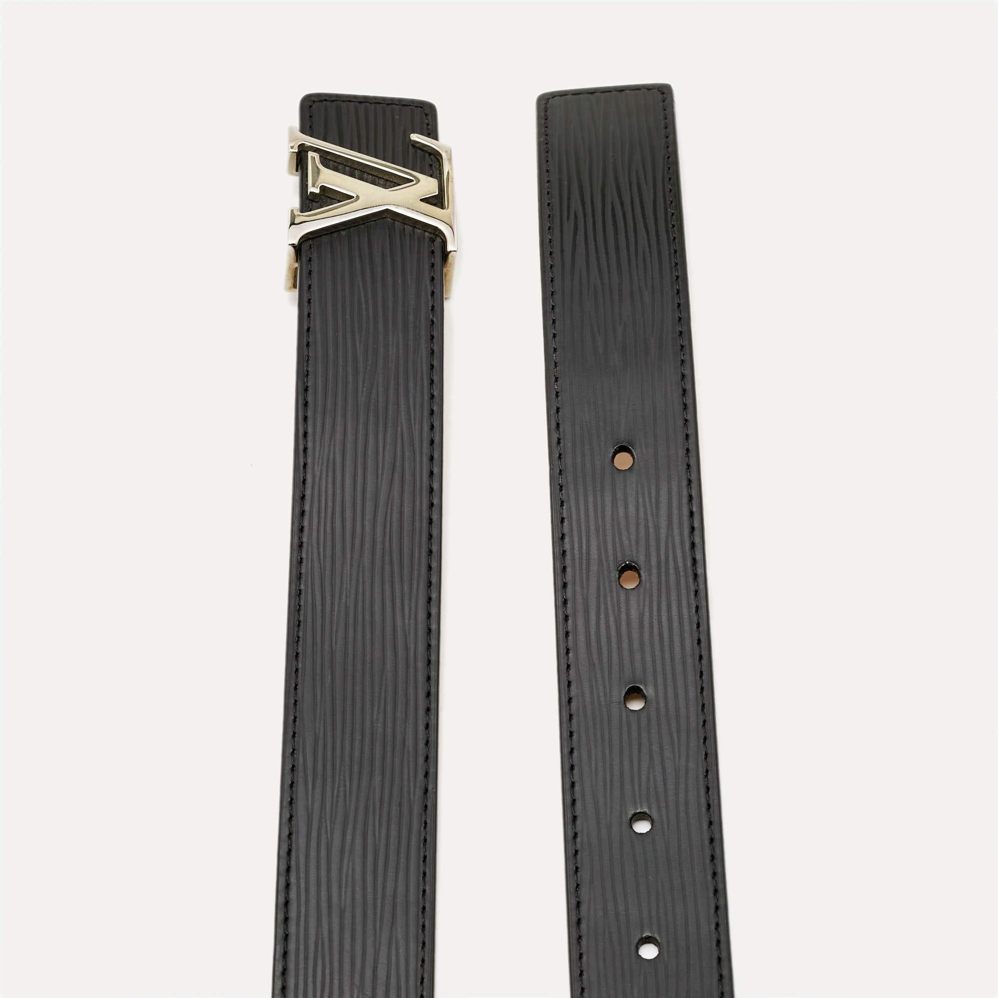 This Initiales belt from Louis Vuitton is simple in design but instantly recognizable as luxury. The Epi leather belt has a buckle in the form of an enlarged LV symbol in silver-tone metal.

Includes: Original Dustbag, Original Box

