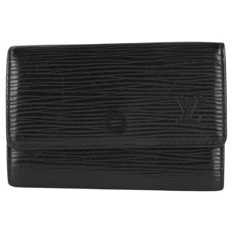Authentic Louis Vuitton 6 Ring Key Holder Black Epi Leather. 