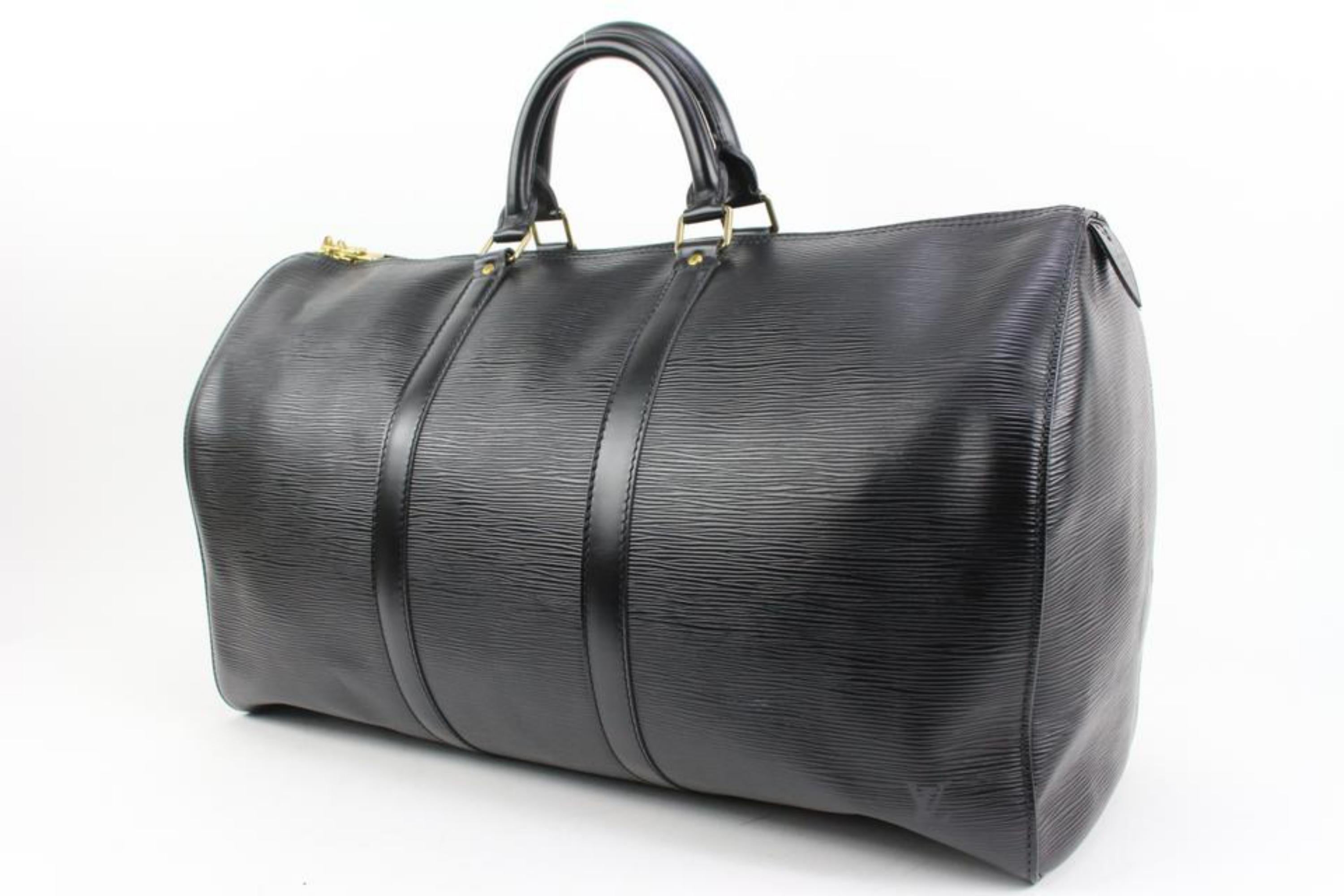 Louis Vuitton Black Epi Leather Noir Keepall 50 Duffle Bag  19lk321s
Date Code/Serial Number: VI0934
Made In: France
Measurements: Length:  20