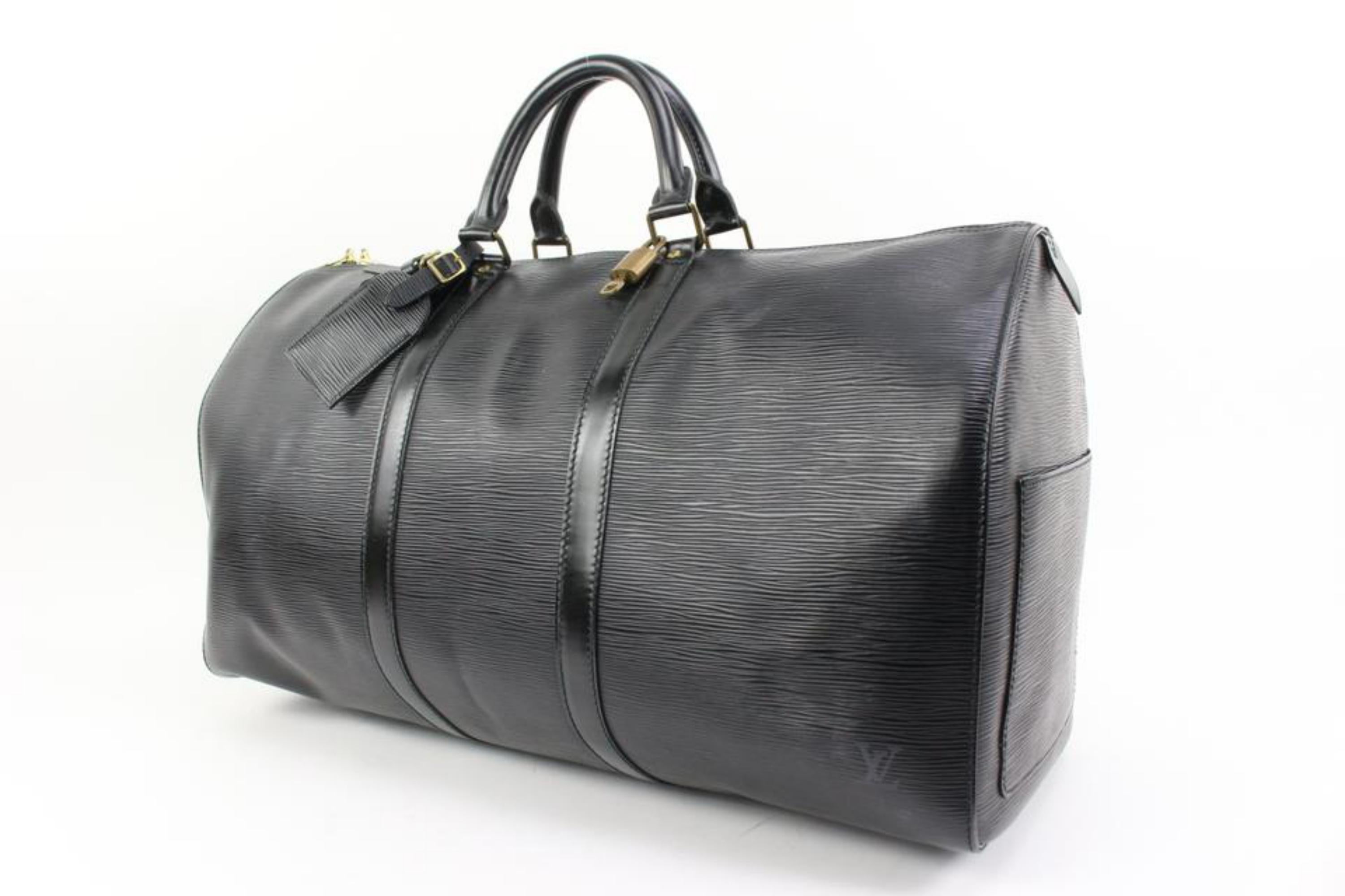 Louis Vuitton Black Epi Leather Noir Keepall 50 Duffle Bag 66lv315s
Date Code/Serial Number: VI0931
Made In: France
Measurements: Length:  20.5