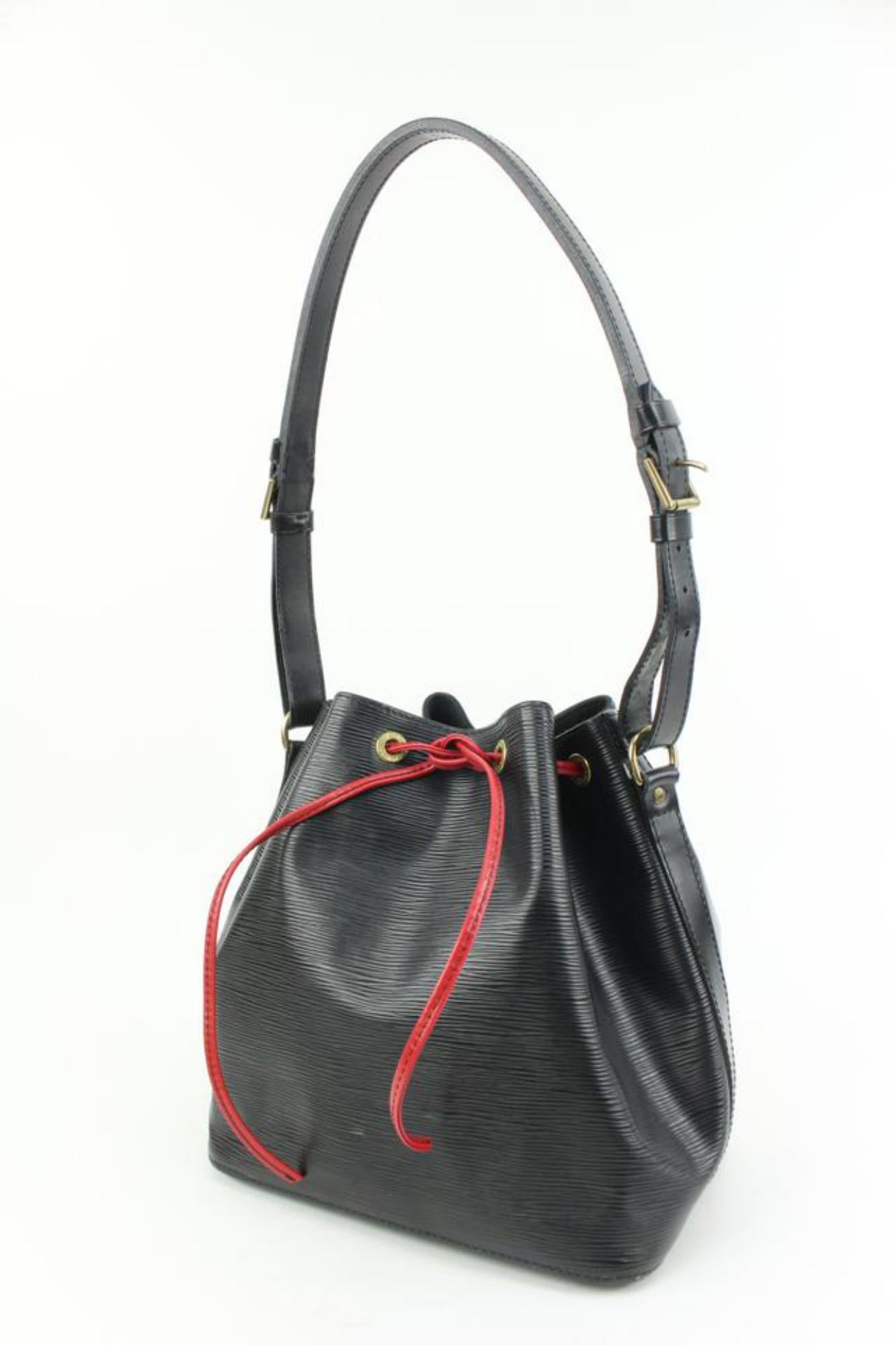Louis Vuitton Black Epi Leather Petit Noe Drawstring Bucket Bag Hobo 62lk38s
Date Code/Serial Number: AR0934
Made In: France
Measurements: Length:  15.5