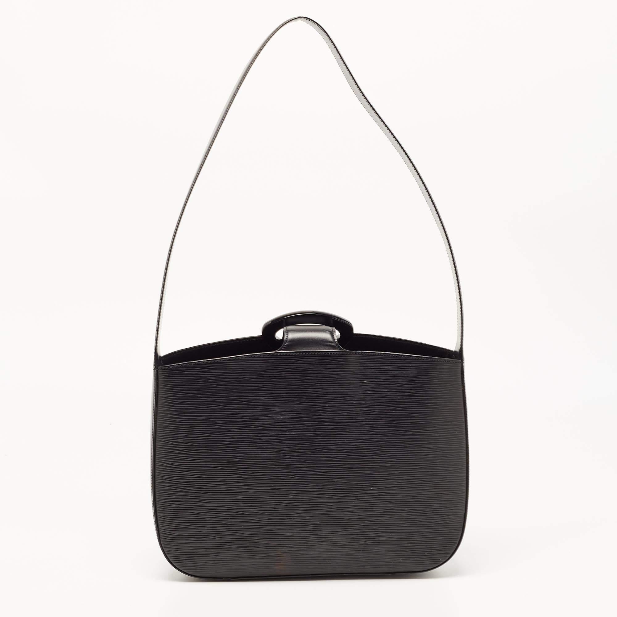 This Louis Vuitton bag is a great pick if you are looking for a sleek and sophisticated bag. Crafted from Epi leather, this black bag has gold-tone hardware, a flat handle, and a loop closure.

