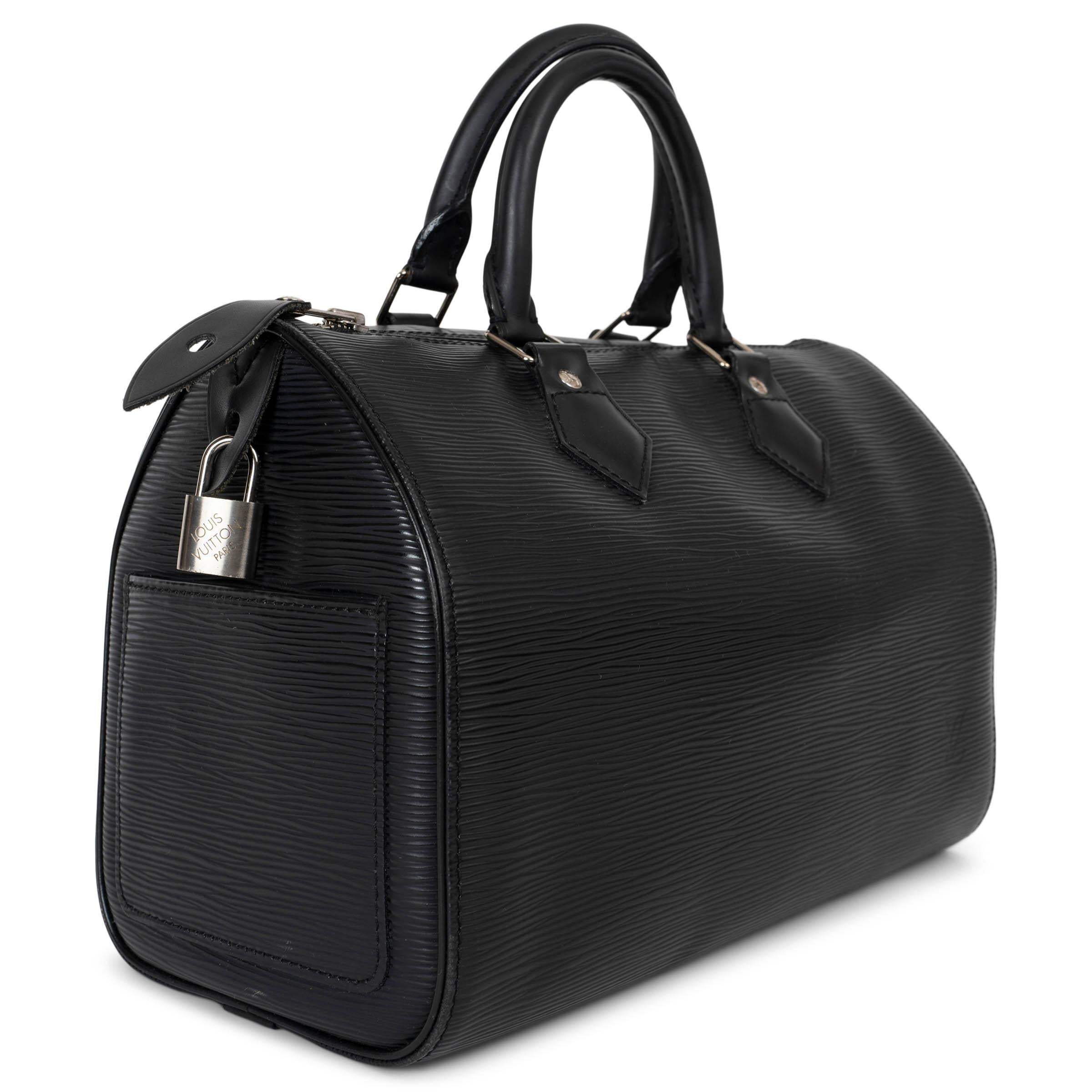 This 100% authentic Louis Vuitton Speedy 30 Handbag in black Epi leather is a timeless and versatile piece. Crafted from durable Epi leather, it features a sleek, structured design with a silver-tone top zipper, adding a modern touch. The interior