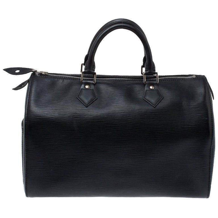 Louis Vuitton Bookbag - For Sale on 1stDibs