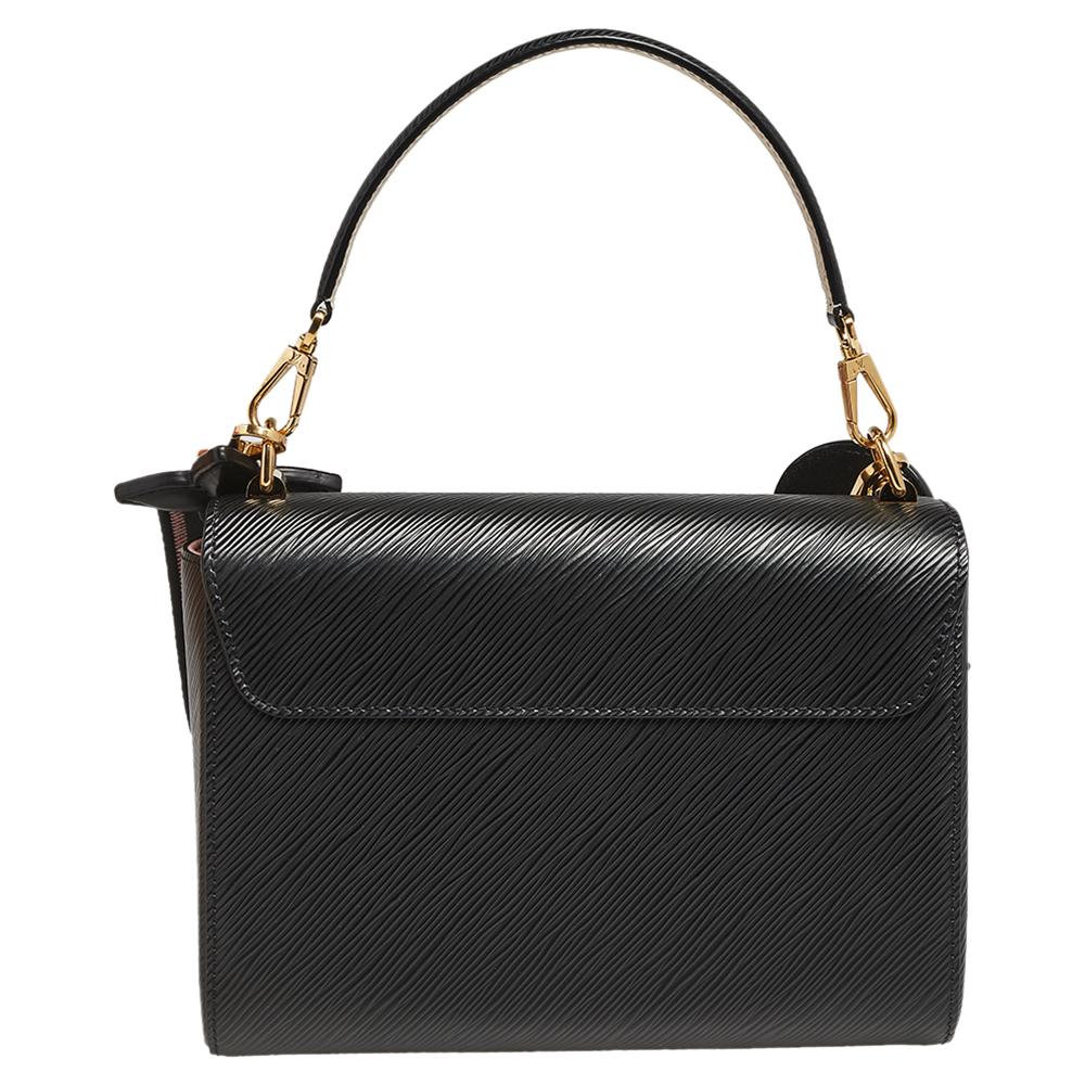 It is every woman's dream to own a Louis Vuitton handbag as appealing as this one. Crafted from Epi leather, this bag features a structured design with a sleek top handle and a branded strap that can be used as a crossbody or hung on the shoulder.