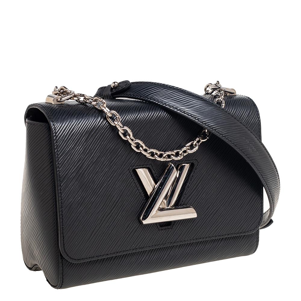 Crafted from Epi Electric leather, this LV bag features a structured design with a sleek strap that can be used as a crossbody or hung on the shoulder. While the classy black shade elevates its beauty, the Alcantara-lined interior will dutifully