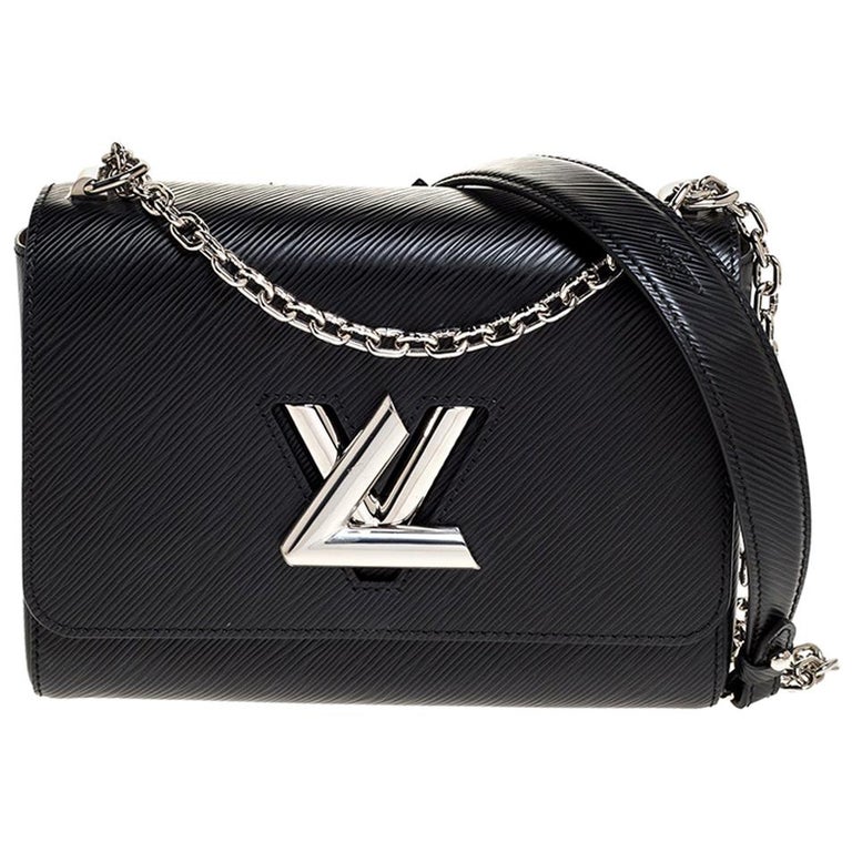 Louis Vuitton Black Epi Leather Twist MM Bag at 1stDibs  louis vuitton  twist tote, lv twist bag, louis vuitton twist and twisty
