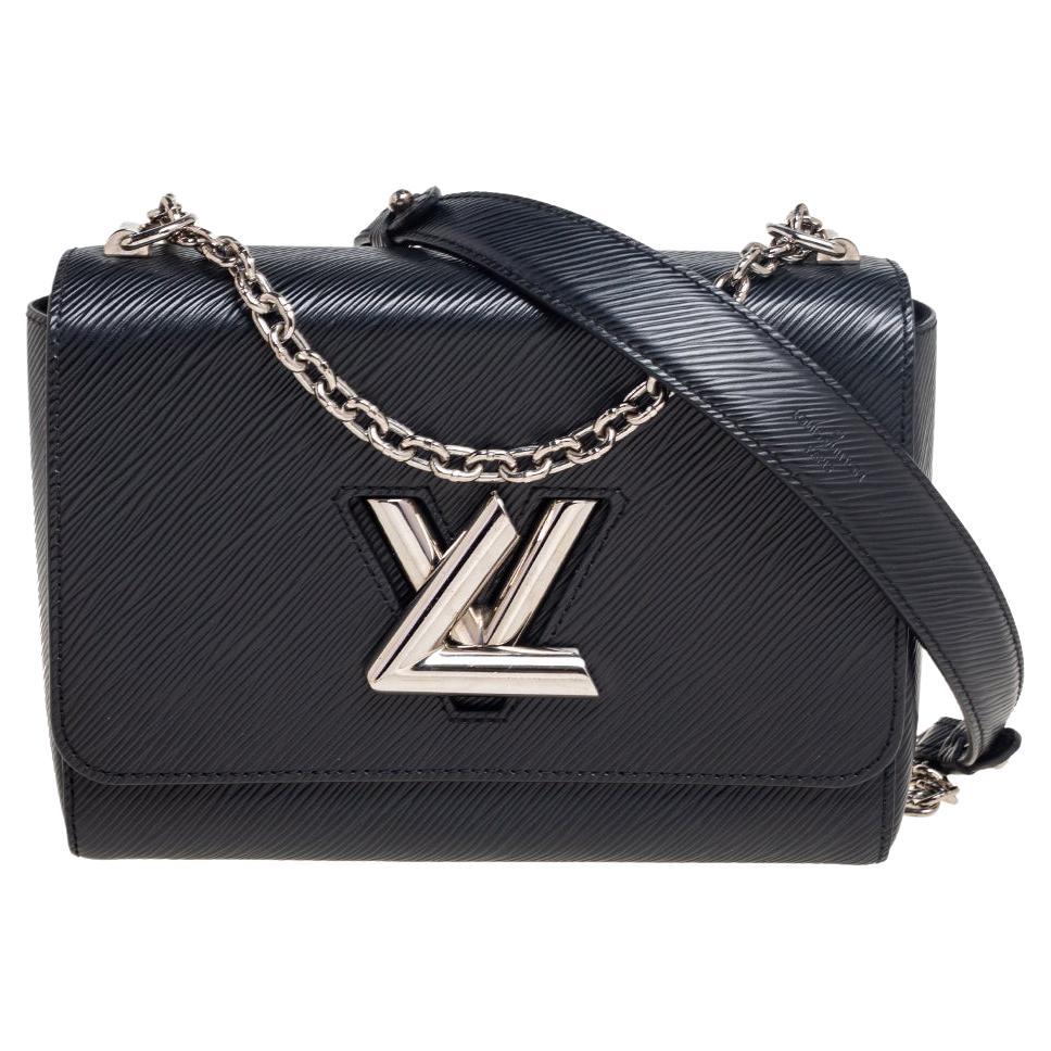 Louis Vuitton Black Epi Leather Twist MM Bag at 1stDibs  louis vuitton  twist tote, lv twist bag, louis vuitton twist and twisty