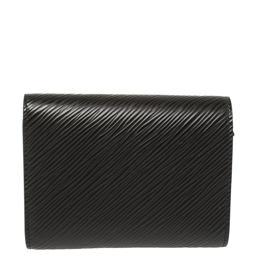 It is every woman's dream to own a Louis Vuitton wallet as appealing as this one. Crafted from epi leather, this creation features a leather-lined interior meant to dutifully hold all your essentials. The flap features an artistic closure wherein a