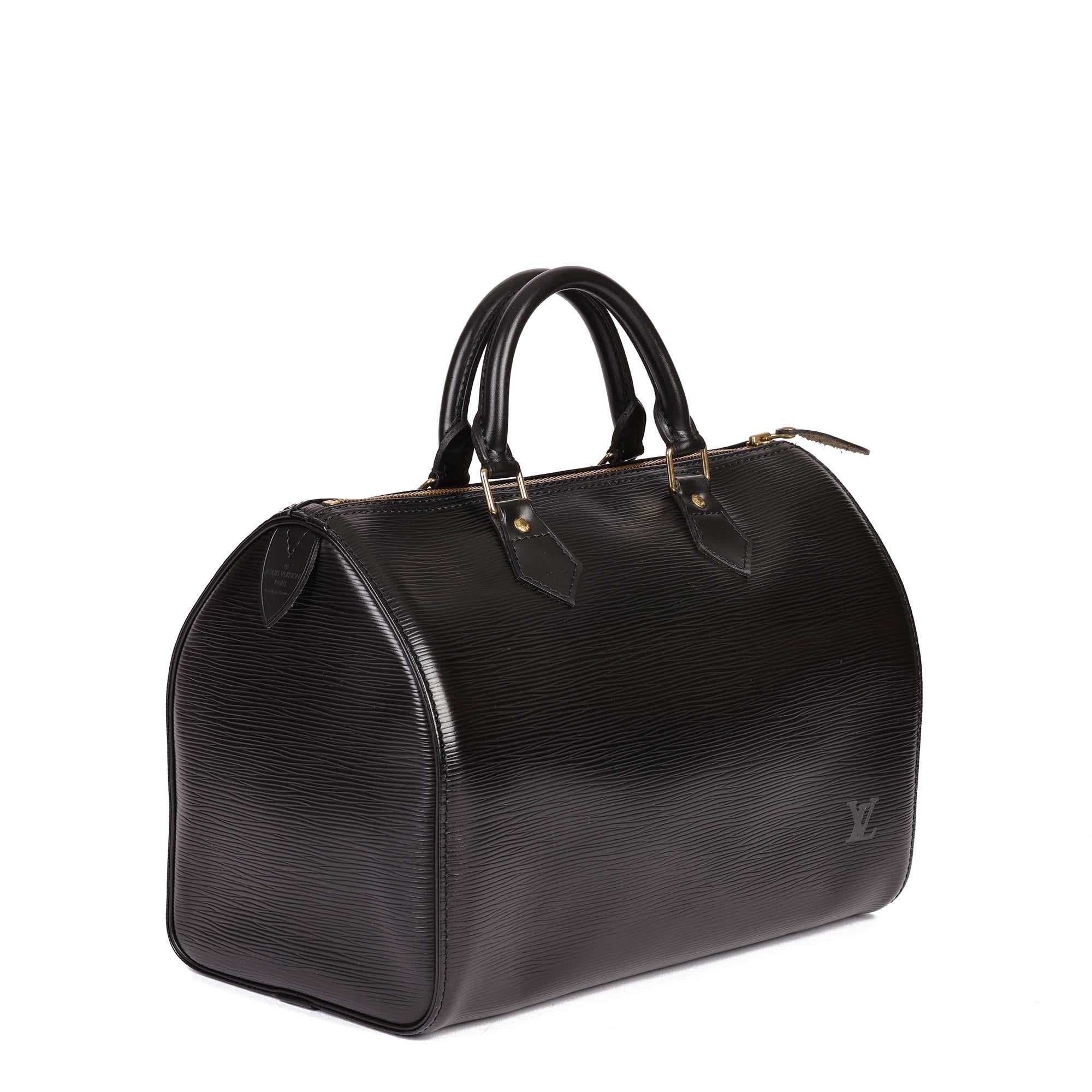 LOUIS VUITTON
Black Epi Leather Vintage Speedy 30cm

Xupes Reference: HB4843
Serial Number: VI0945
Age (Circa): 1995
Accompanied By: X
Authenticity Details: Date Stamp (Made in France)
Gender: Ladies
Type: Tote

Colour: Black
Hardware: Golden