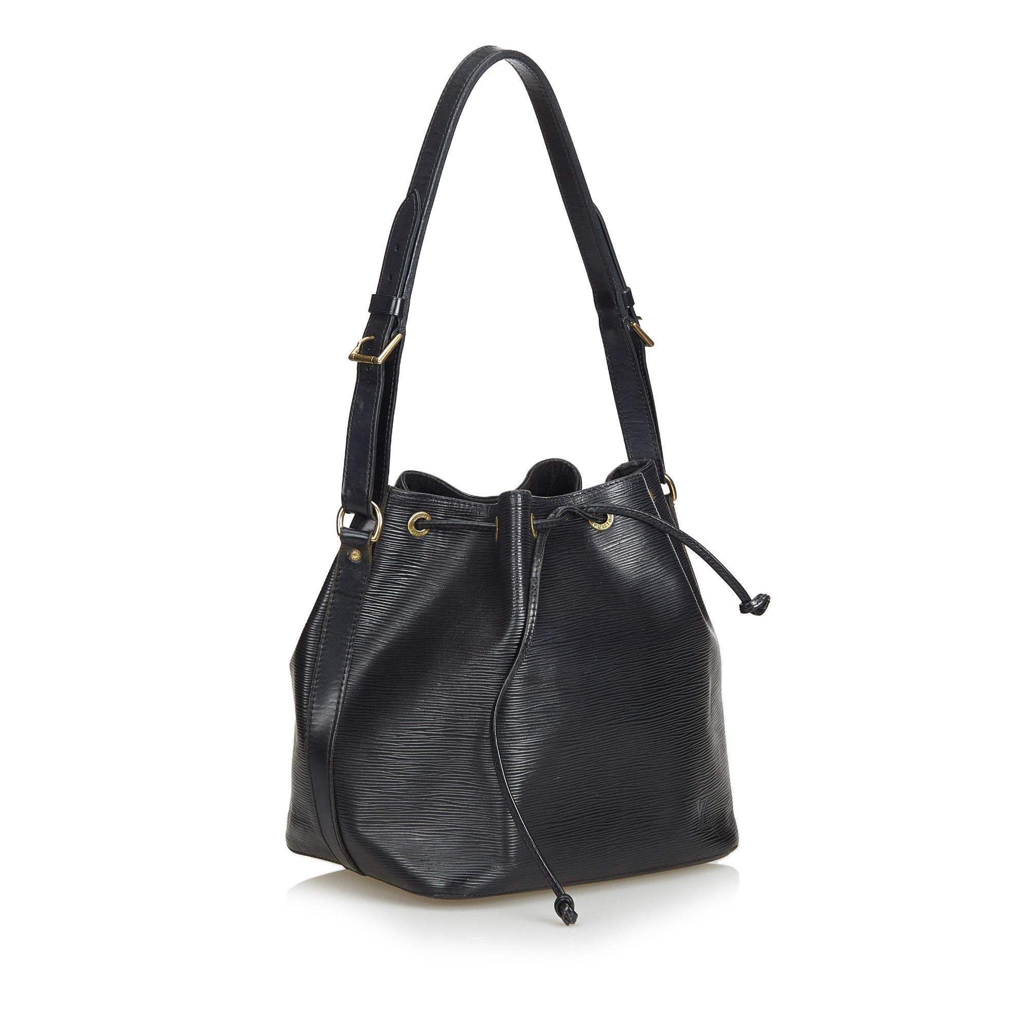 The Petit Noe features Epi leather, an adjustable shoulder strap, a drawstring closure, Alcantara lining, and an interior zip pocket. It carries as B condition rating.

Inclusions: 
This item does not come with inclusions.


Louis Vuitton pieces do