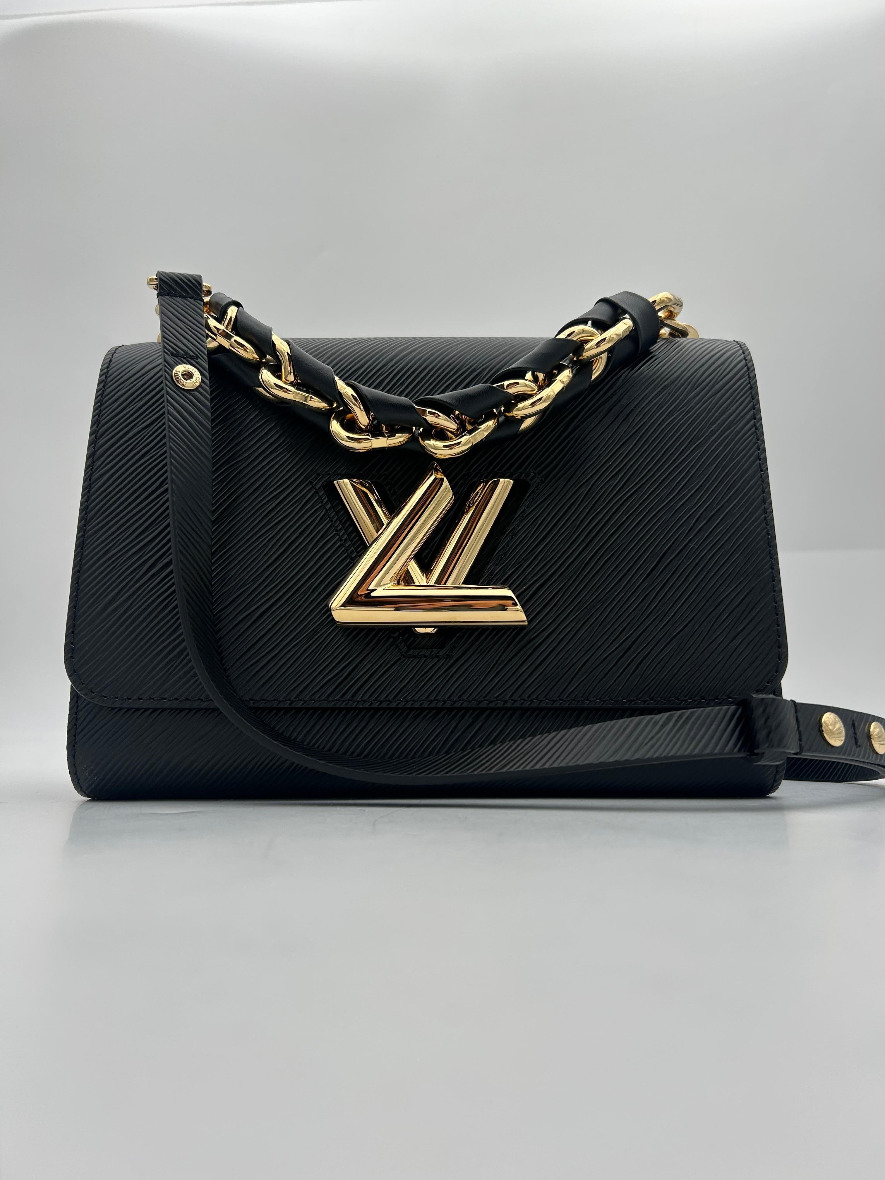 Louis Vuitton Black Epi Twist MM Leather Handle In Excellent Condition For Sale In Palm Beach, FL