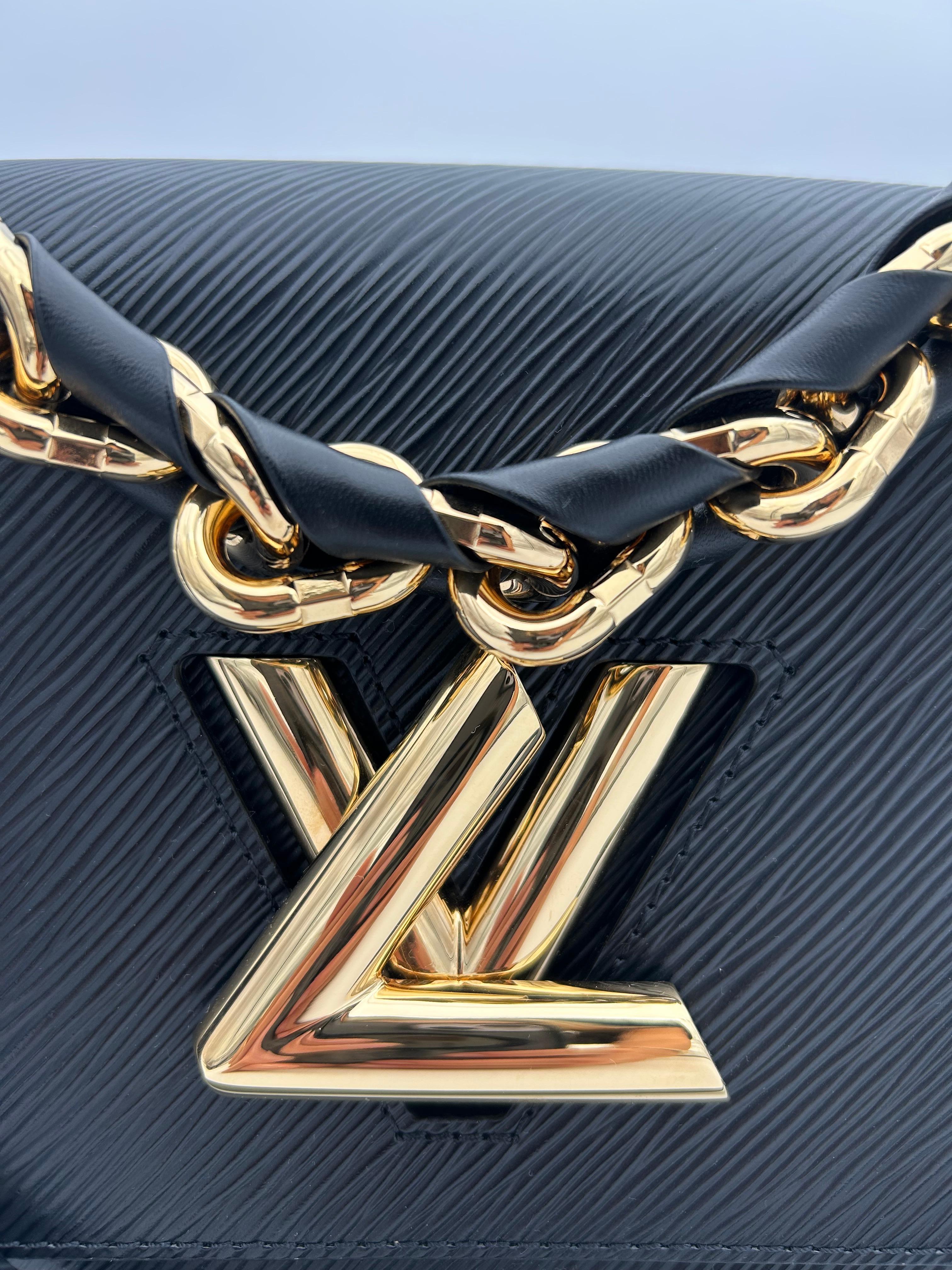 Women's or Men's Louis Vuitton Black Epi Twist MM Leather Handle For Sale