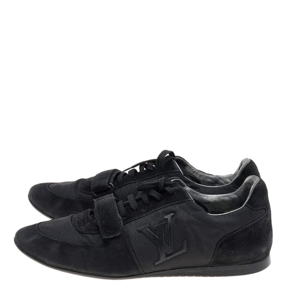 Coming in a classic low-top silhouette, these Louis Vuitton sneakers are a seamless combination of luxury, comfort, and style. They are made from fabric and suede in a black shade. These sneakers are designed with logo details, laced-up vamps, and