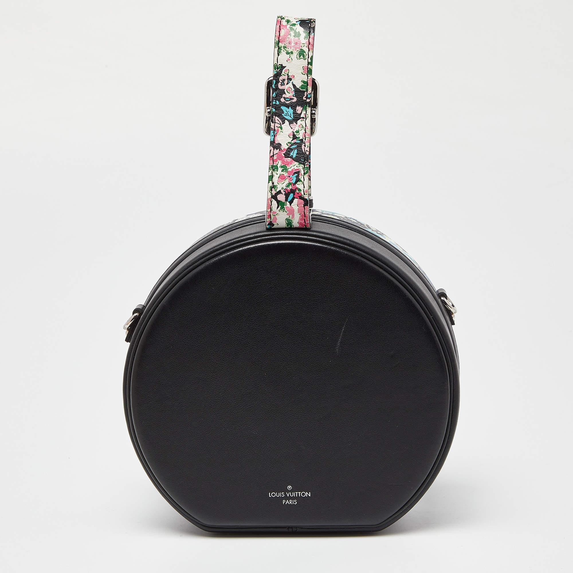 First seen on the Cruise 2018 runway show, Nicolas Ghesquière designed the Petite Boite Chapeau as a reimagined version of one of the brand's famous travel bags, the Hatbox. This bag is made from floral-print leather in the signature circular shape