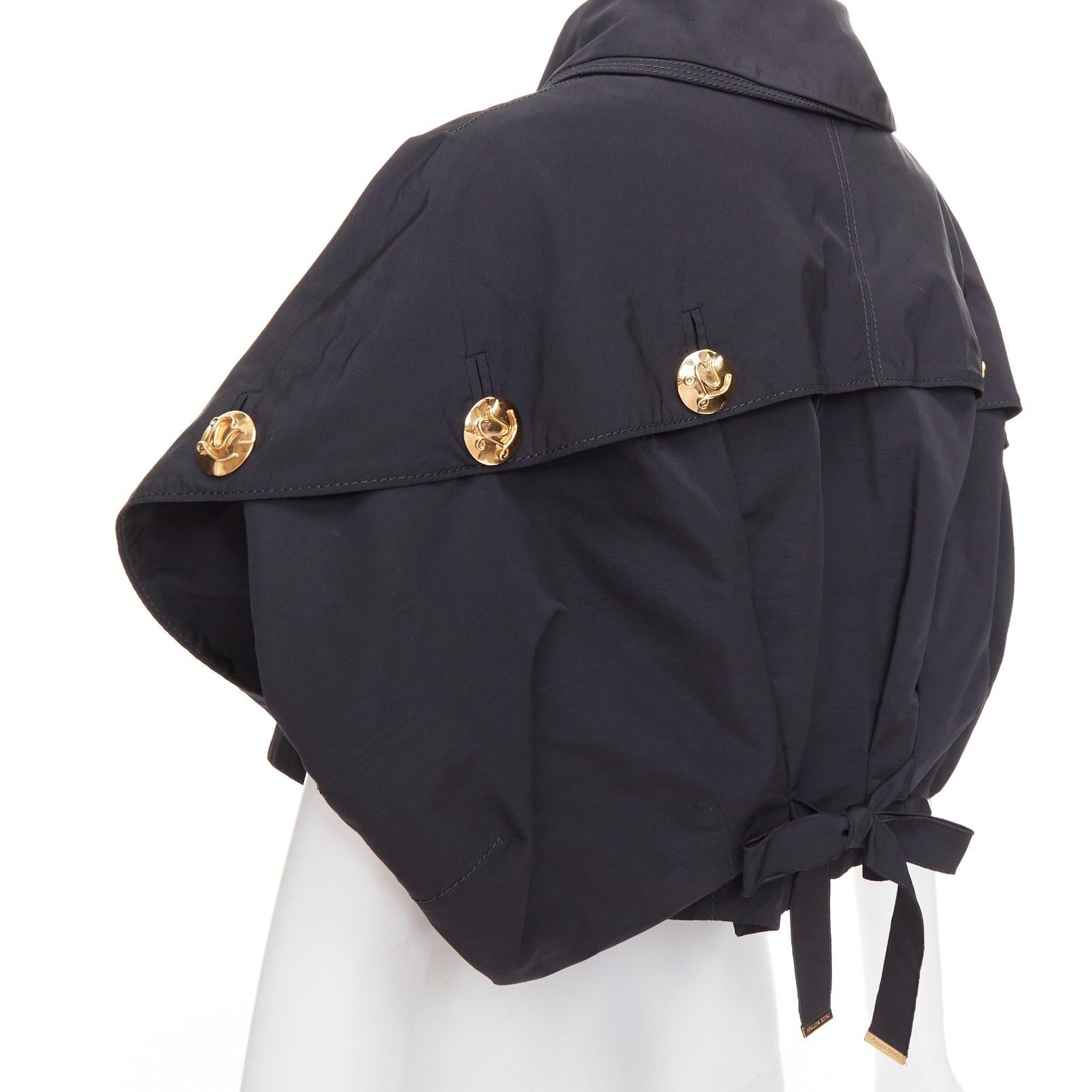 LOUIS VUITTON black georgette gold italic LV buttons cropped jacket FR34 XS
Reference: TGAS/E00881
Brand: Louis Vuitton
Designer: Marc Jacobs
Material: Polyester
Color: Black, Gold
Pattern: Solid
Closure: Button
Lining: Black Cotton
Extra Details: A
