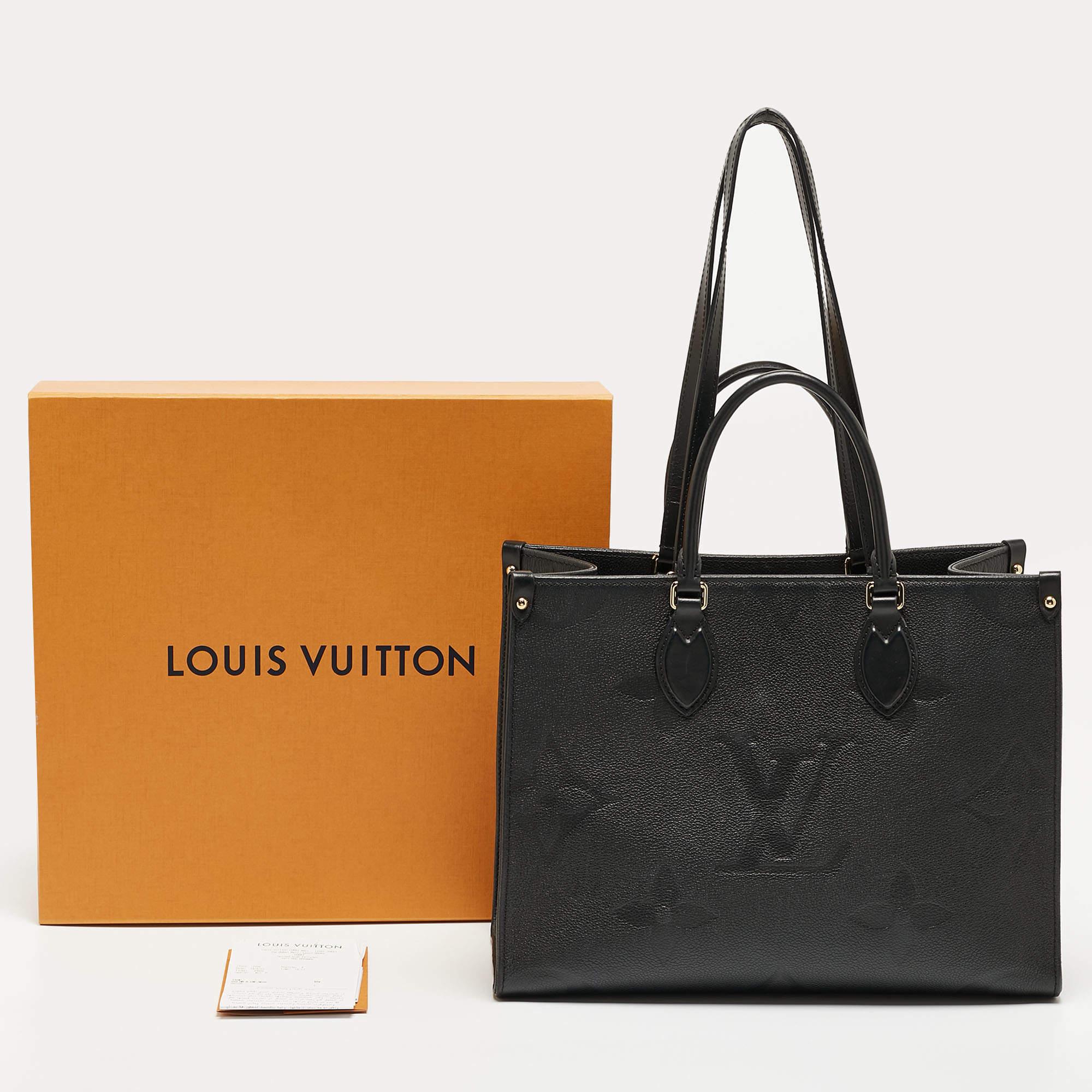 Louis Vuitton Black Giant Monogram Empreinte Leather Onthego MM Bag In Good Condition In Dubai, Al Qouz 2