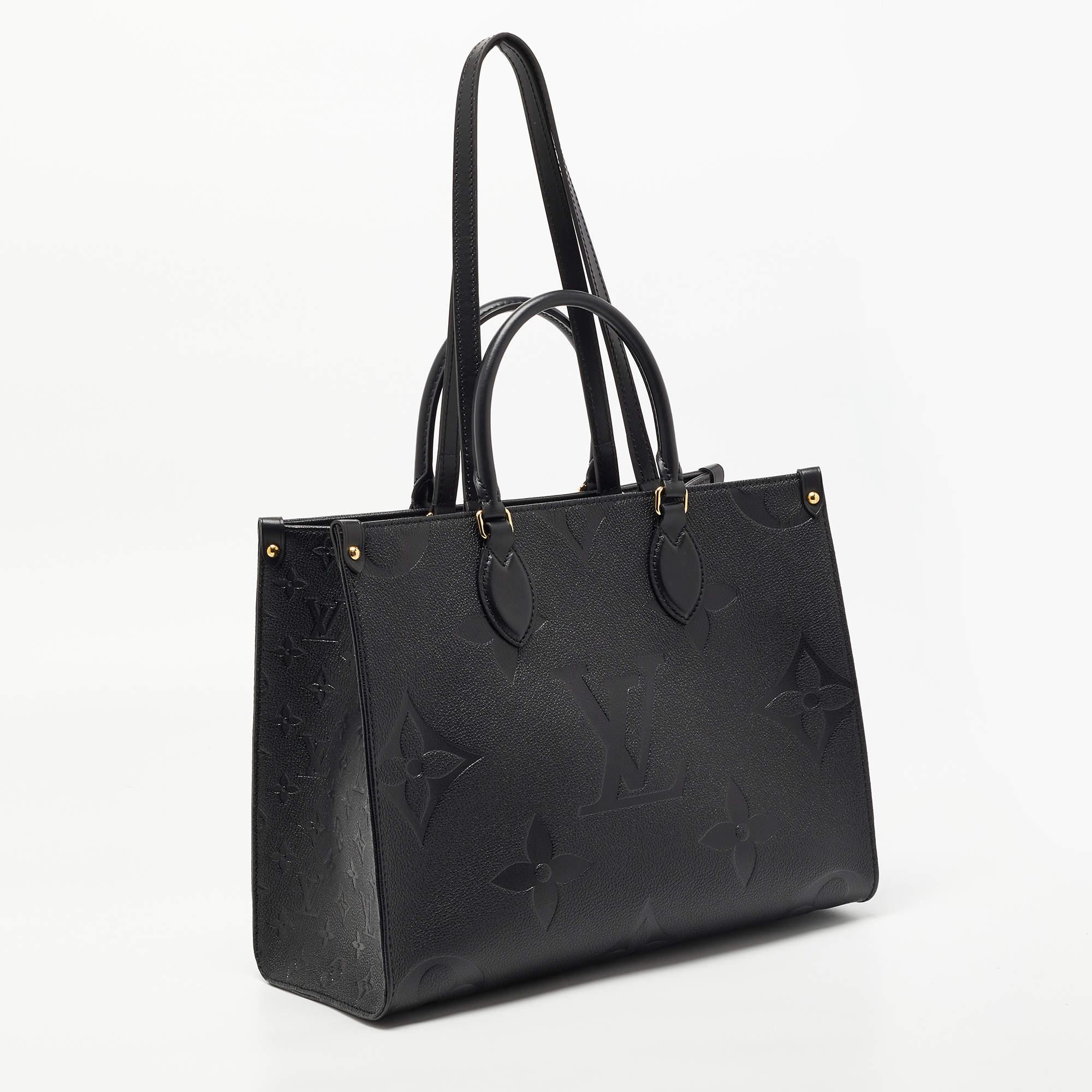 Louis Vuitton Black Giant Monogram Empreinte Leather Onthego MM Bag In New Condition In Dubai, Al Qouz 2