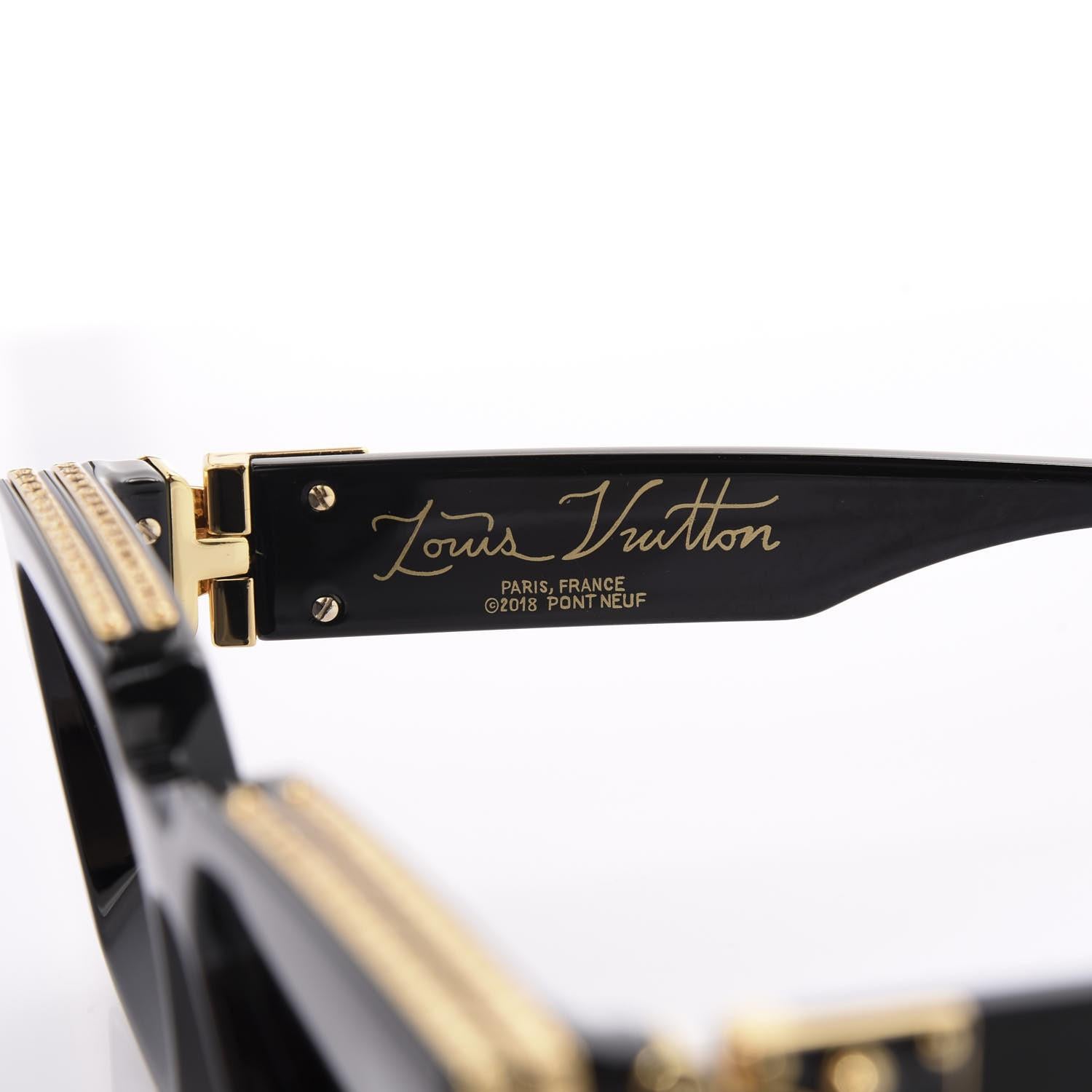 Lunettes de soleil Louis Vuitton avec détails en or noir Unisexe en vente