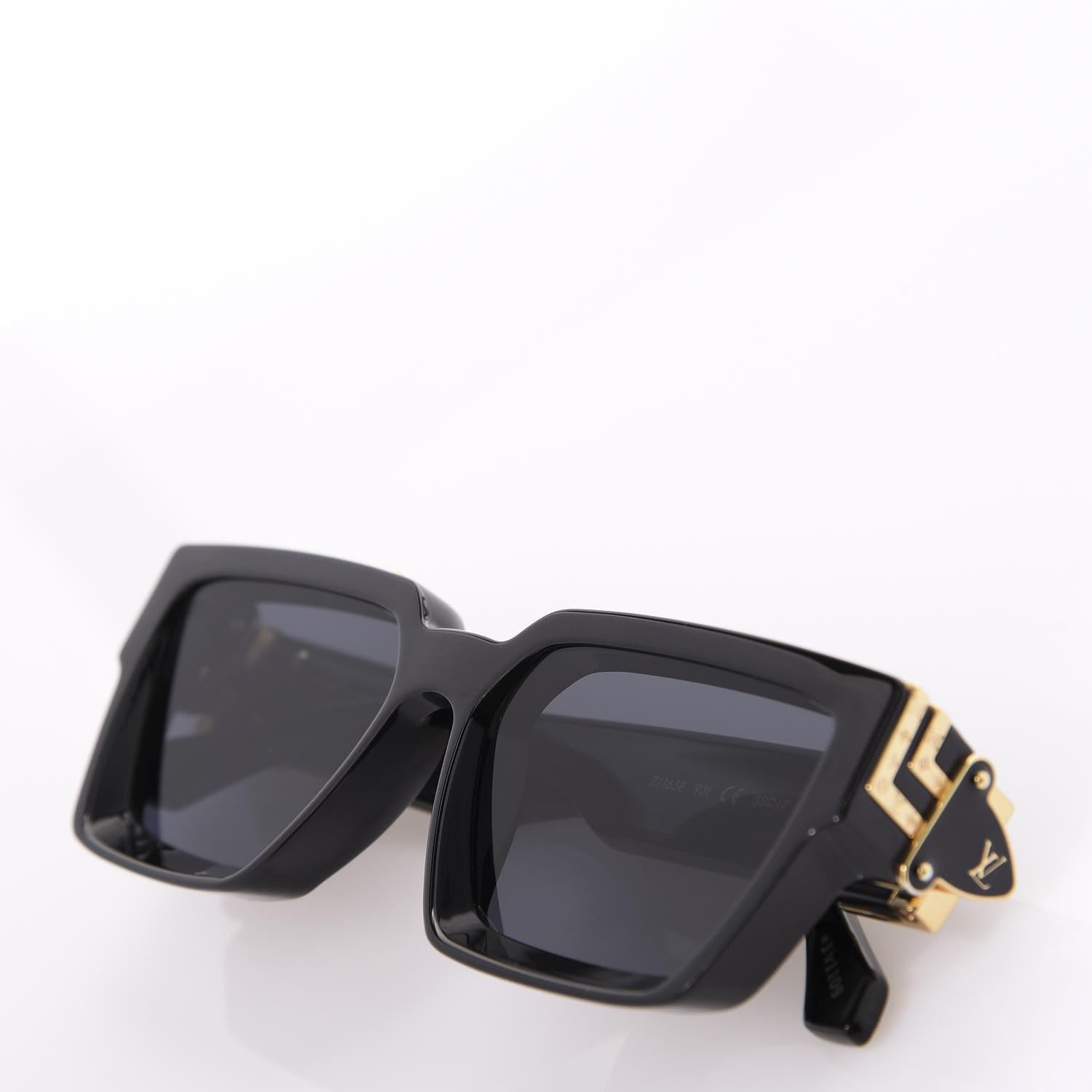 Lunettes de soleil Louis Vuitton avec détails en or noir en vente 3