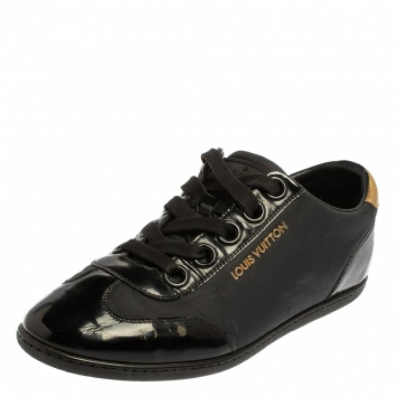 Look stylish and smart by wearing these serene-looking black and gold sneakers on a casual day out or to play golf. This pair from Louis Vuitton is made from the best quality of leather and nylon. Its vamps are laced up perfectly and have snug