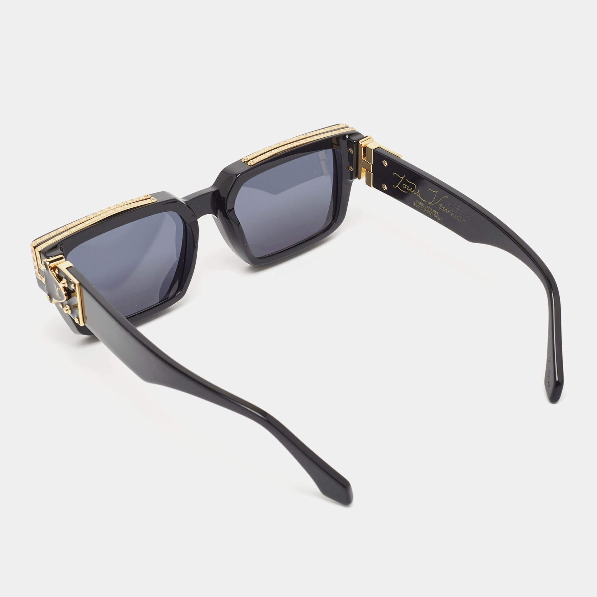 Louis Vuitton's Millionaires sunglasses are a stylish option for when you're out in the sun. They're made from black acetate and beautified with gold-tone metal fittings.

