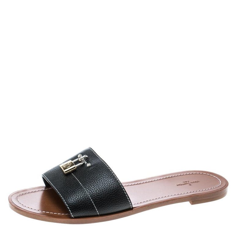 Louis Vuitton Black Grained Leather Lock It Flat Slides Size 41 For Sale at 1stdibs