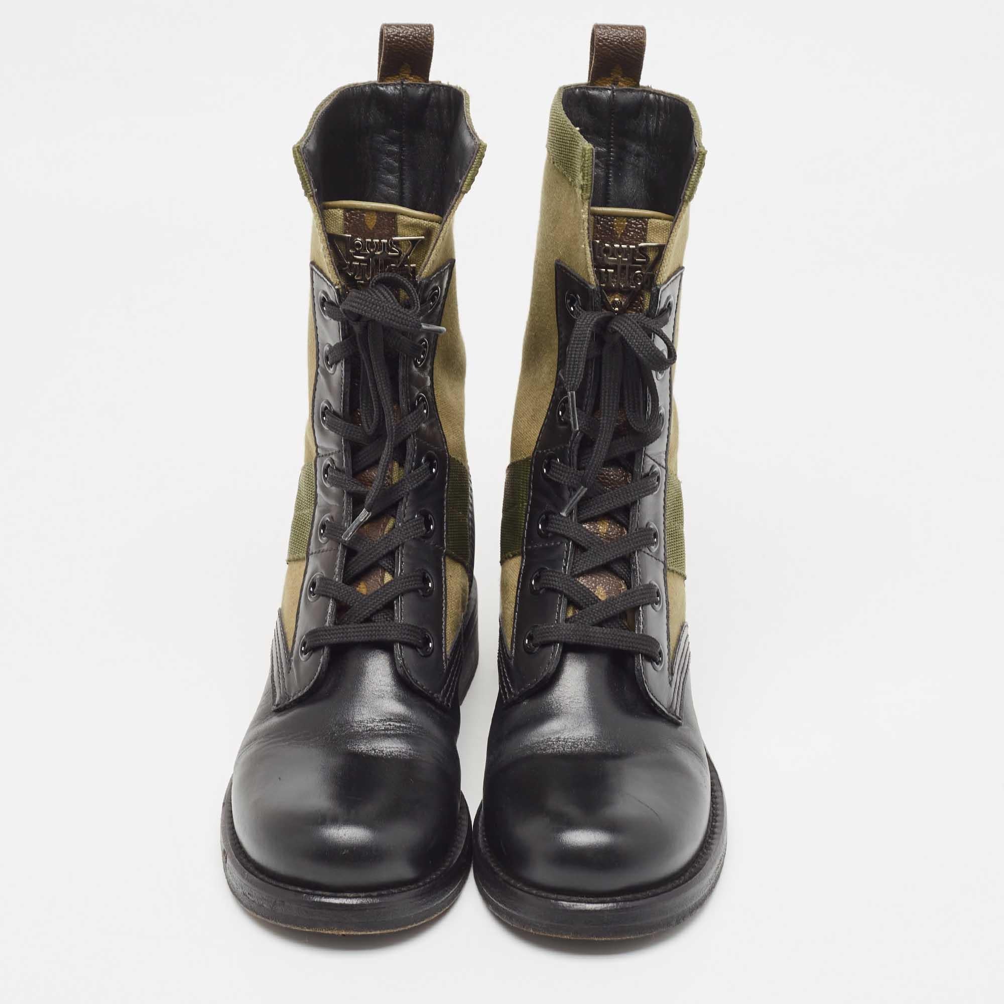 Complete your outfit with these boots from Louis Vuitton. They're fashioned in canvas & leather and secured with simple lace-ups on the uppers.

Includes: Original Dustbag

