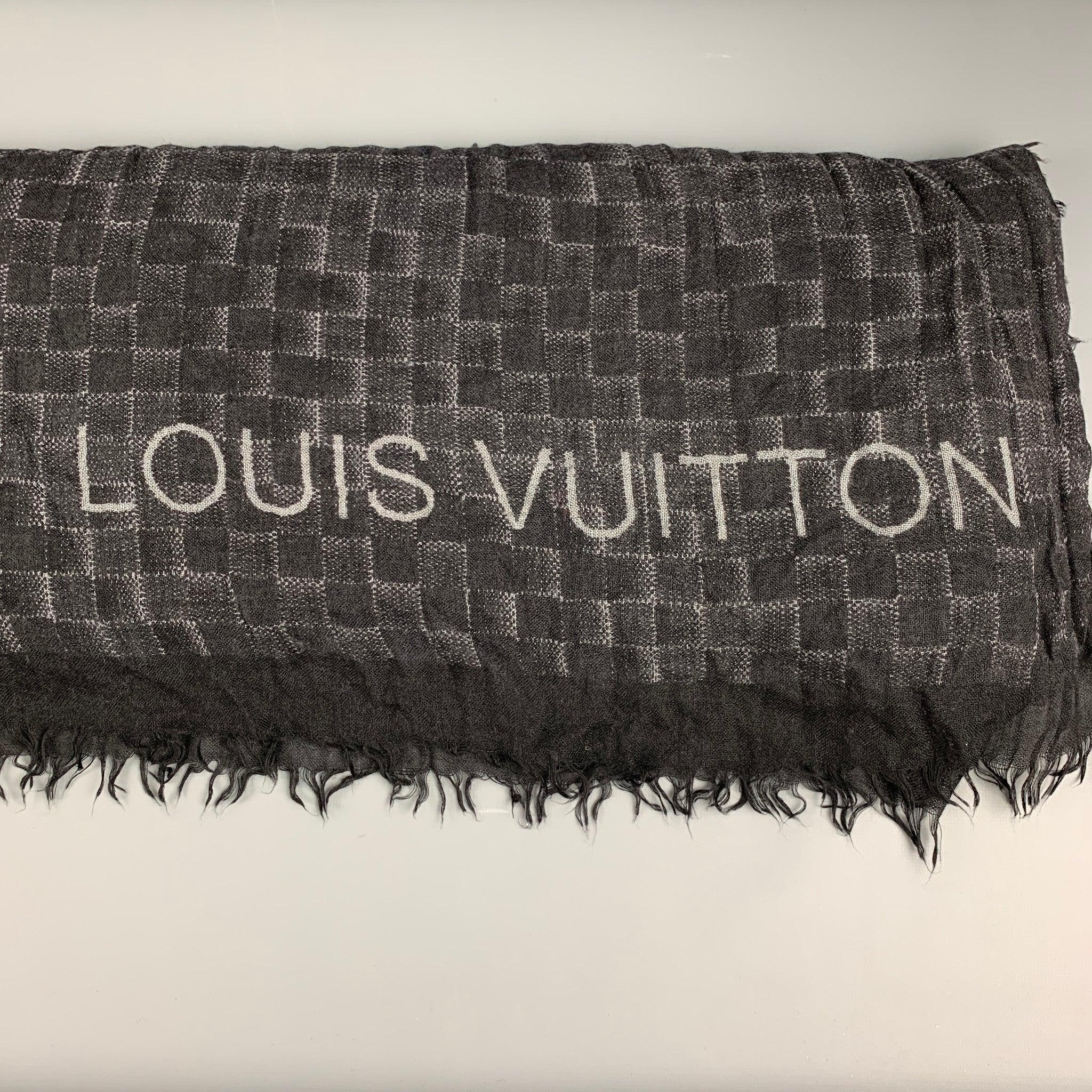 LOUIS VUITTON scarf comes in a black & grey damier print with a fringe trim. Made in Italy. Very Good Pre-Owned Condition. 

Measurements: 
  74 inches  x 52 inches  
  
  
Reference: 126856
Category: Scarves & Shawls
More Details
    
Brand:  LOUIS